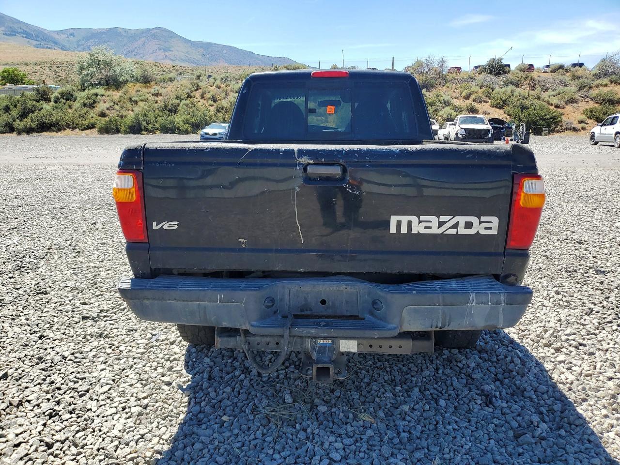 2003 Mazda B4000 Cab Plus Black vin: 4F4YR17E53TM12411
