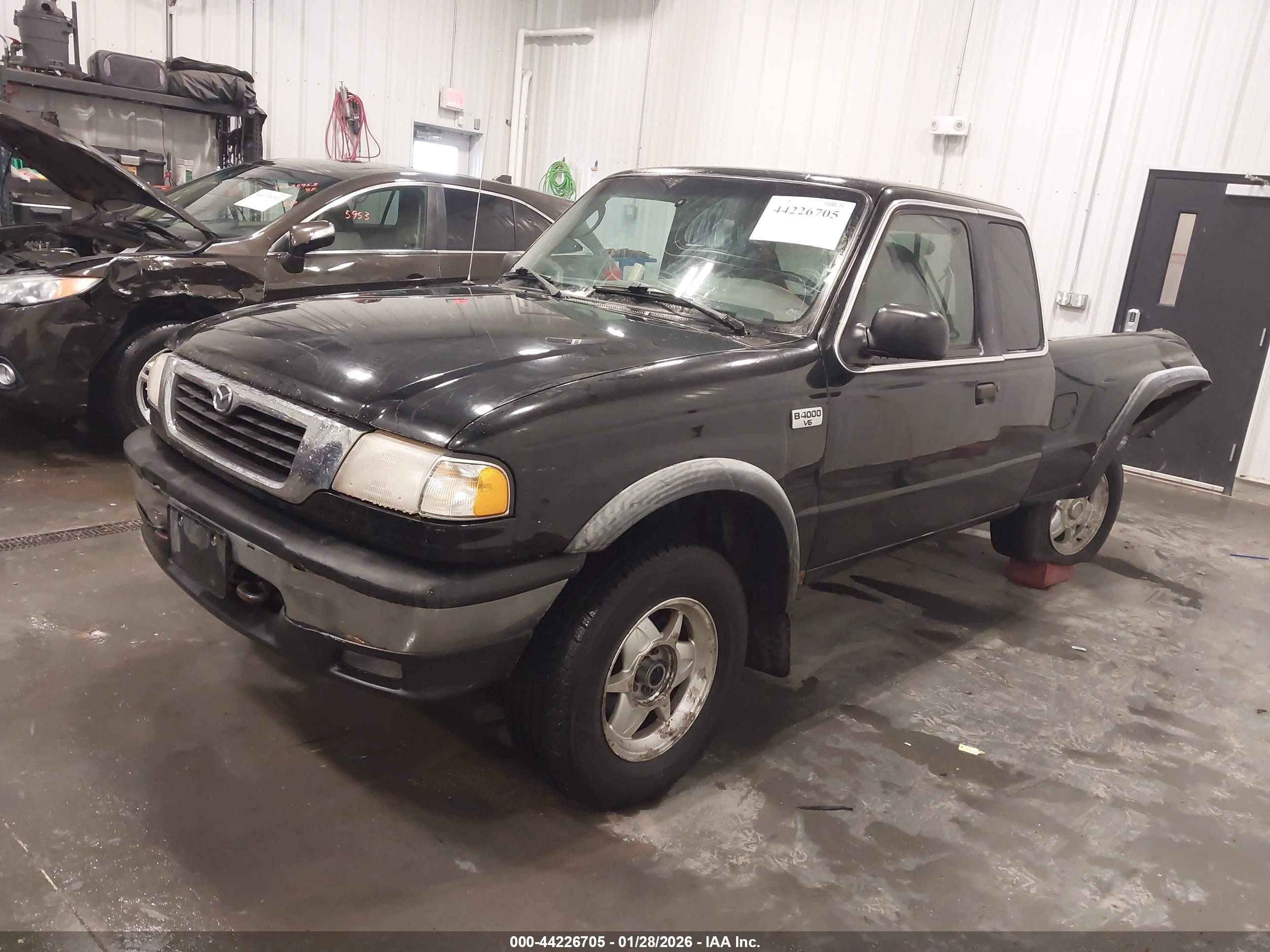 1999 Mazda B4000 Se/tl Black vin: 4F4ZR17X5XTM37689