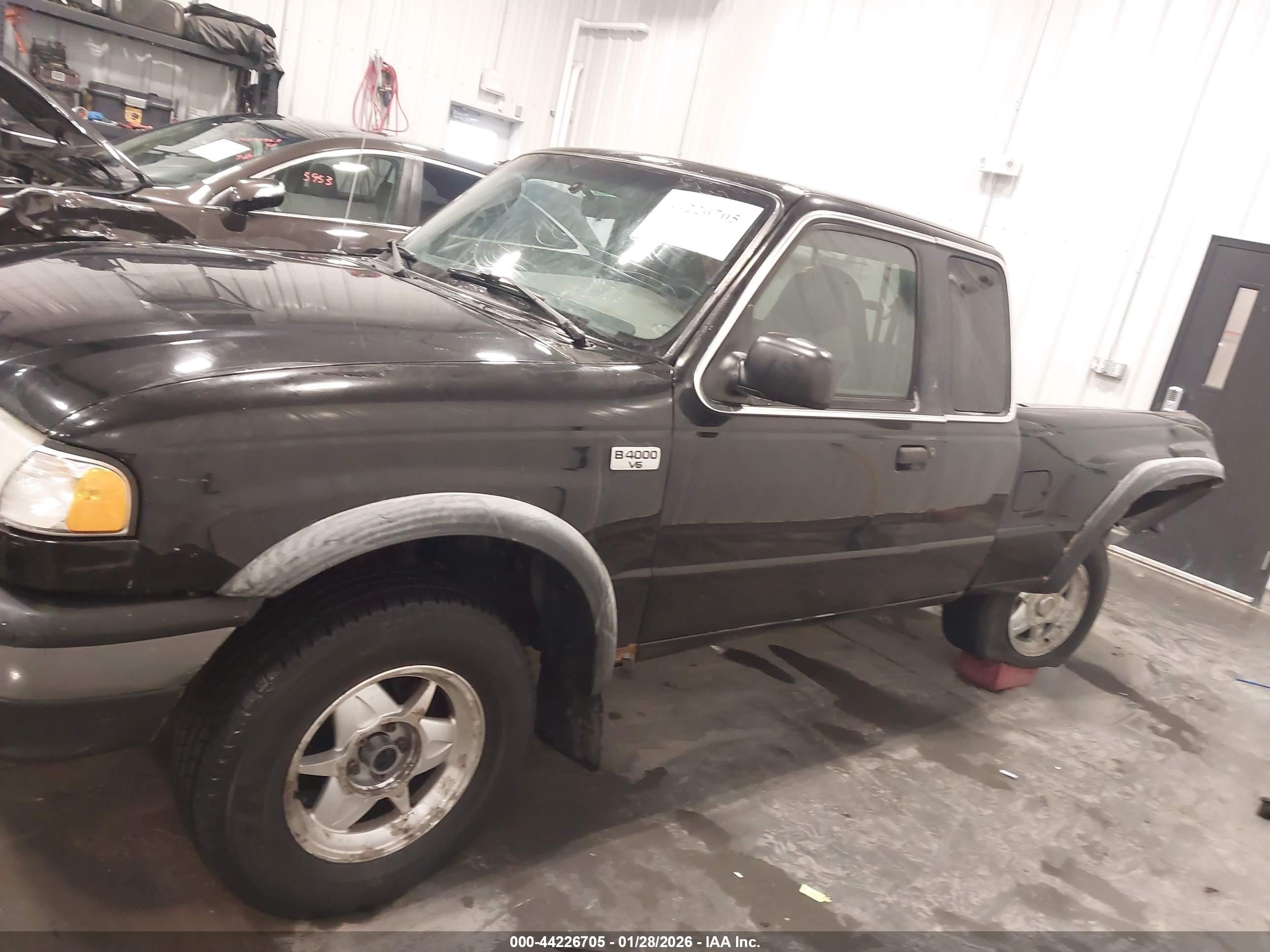1999 Mazda B4000 Se/tl Black vin: 4F4ZR17X5XTM37689