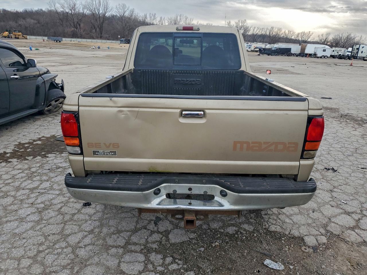 1999 Mazda B4000 Cab Plus Tan vin: 4F4ZR17XXXTM15543