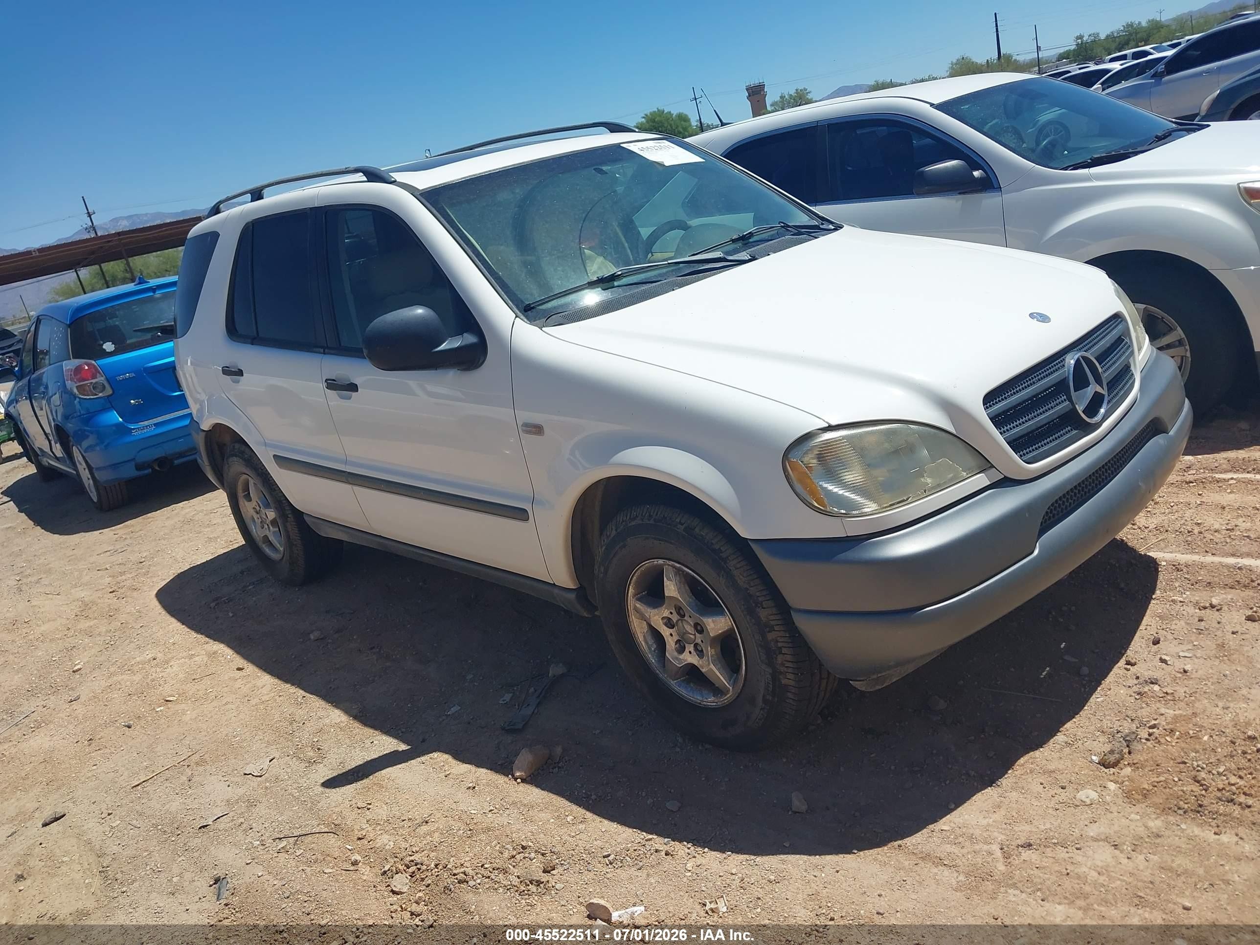 1999 Mercedes-benz Ml 320   White vin: 4JGAB54E1XA133237