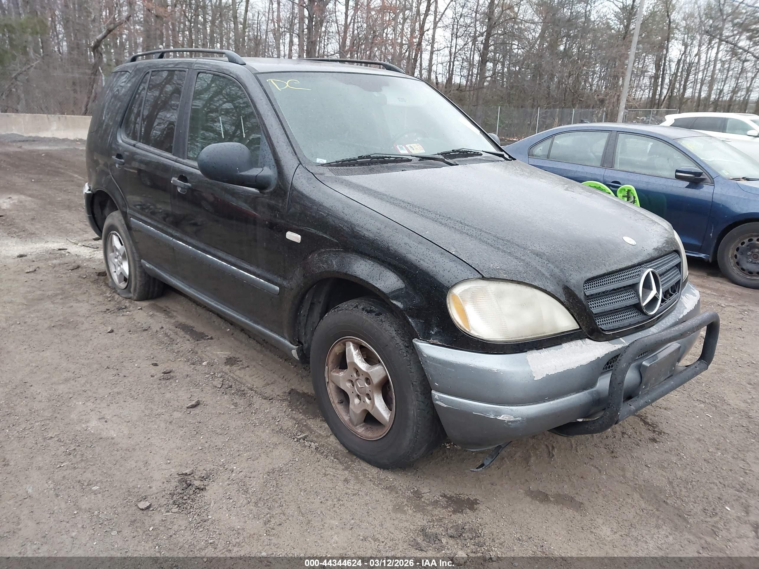 1999 Mercedes-benz Ml 320   Black vin: 4JGAB54E2XA058113