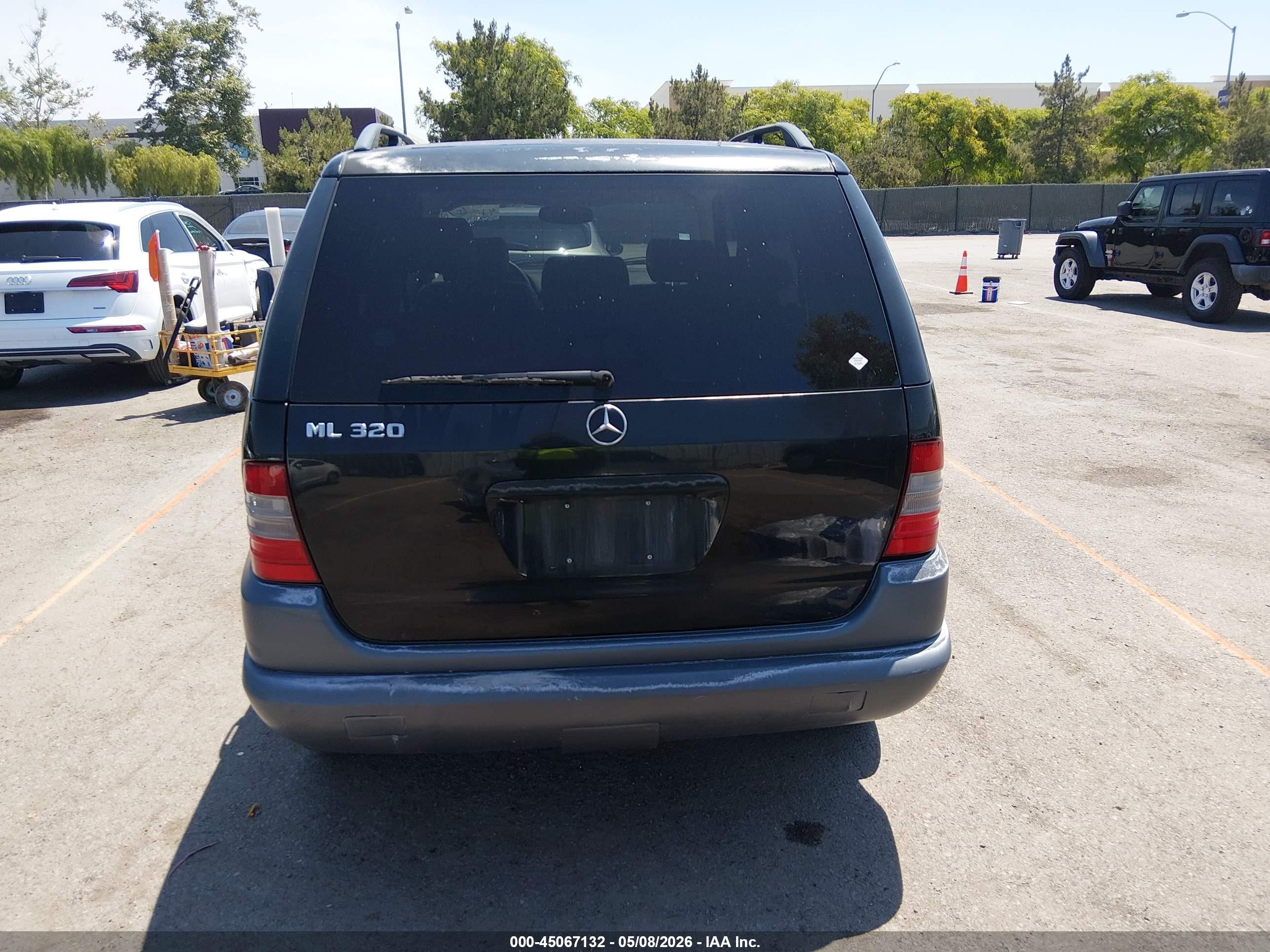 1999 Mercedes-benz Ml 320   Черный vin: 4JGAB54E3XA123745