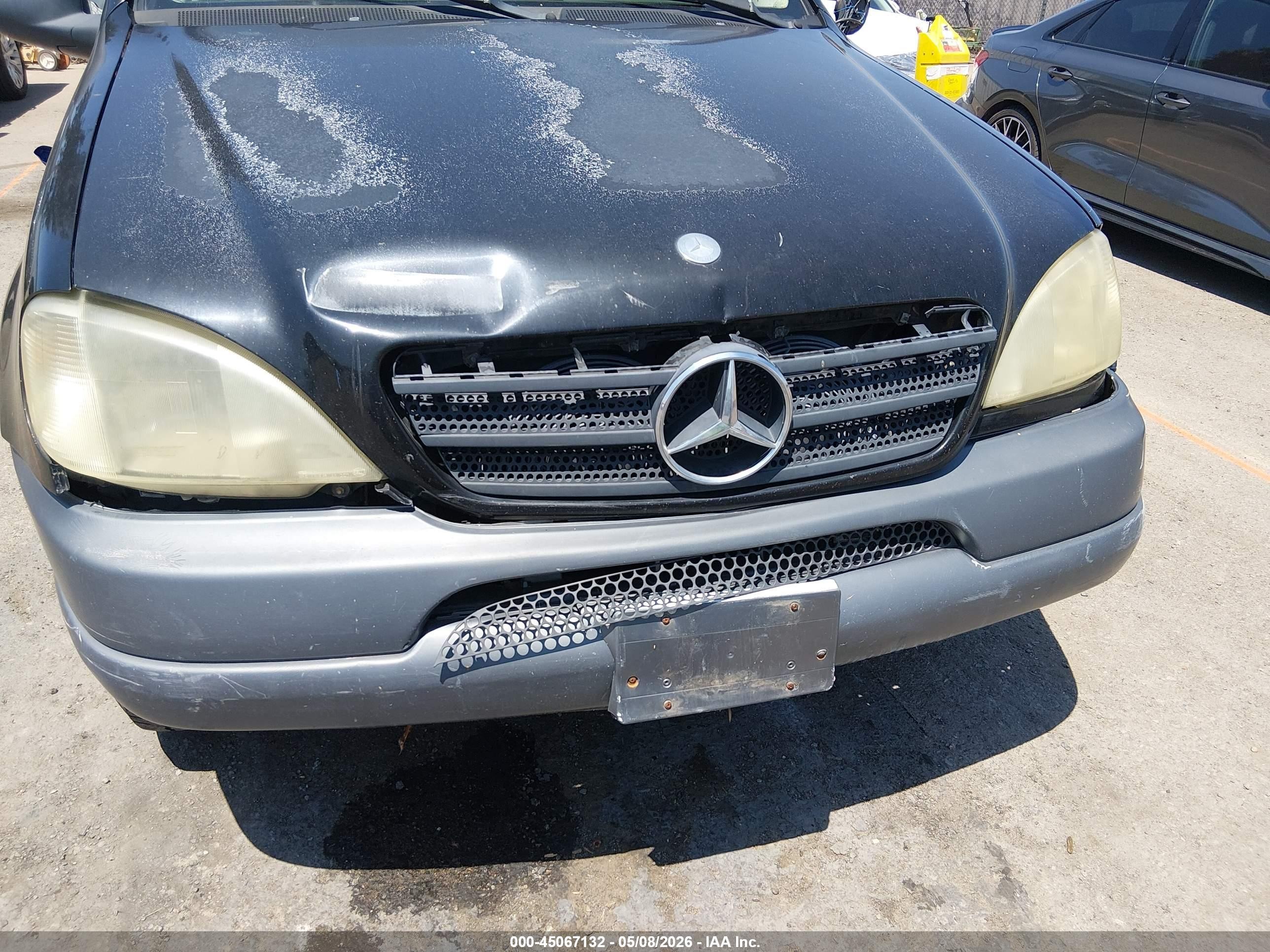1999 Mercedes-benz Ml 320   Черный vin: 4JGAB54E3XA123745