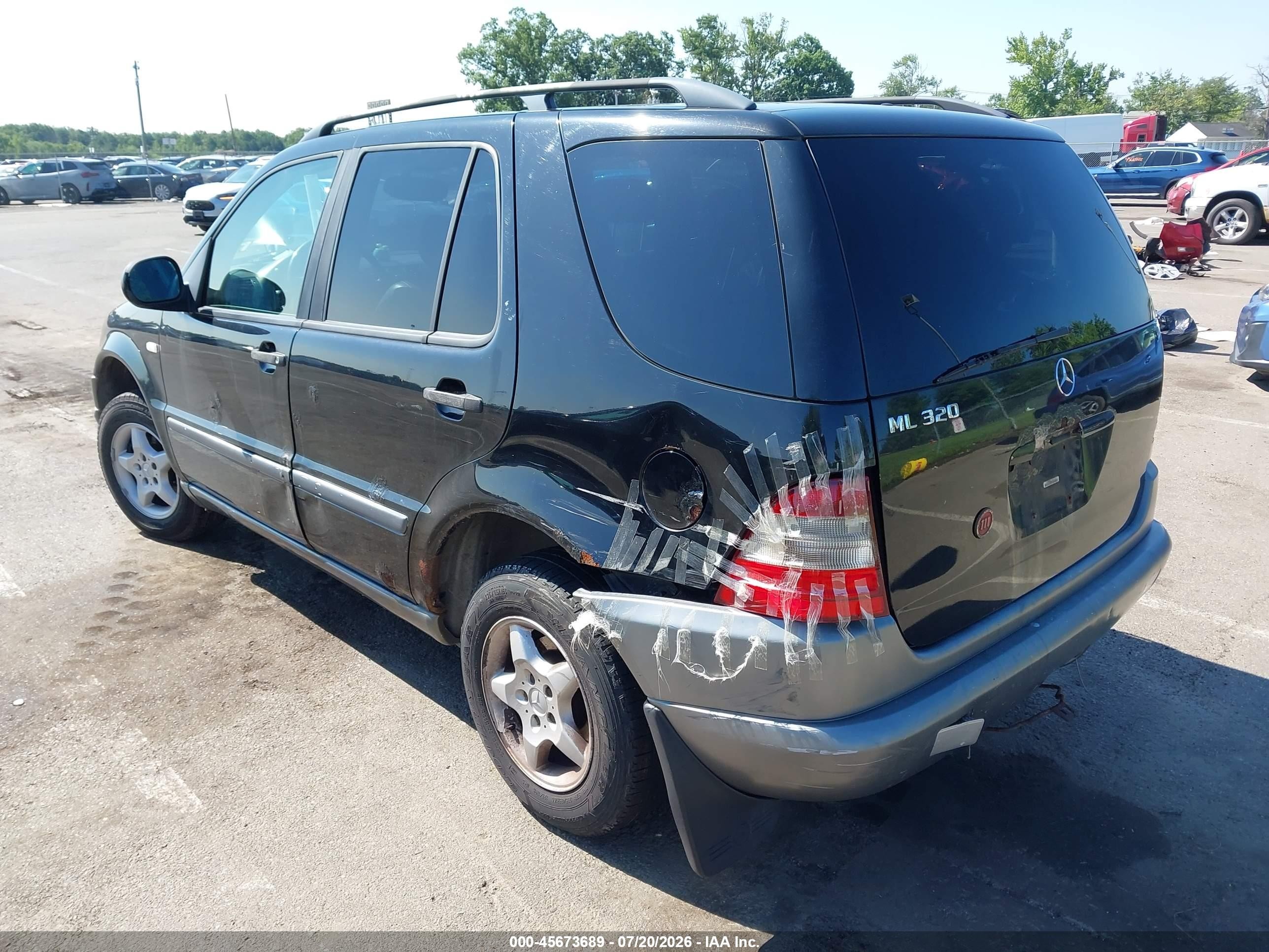 1999 Mercedes-benz Ml 320   Black vin: 4JGAB54E7XA087915