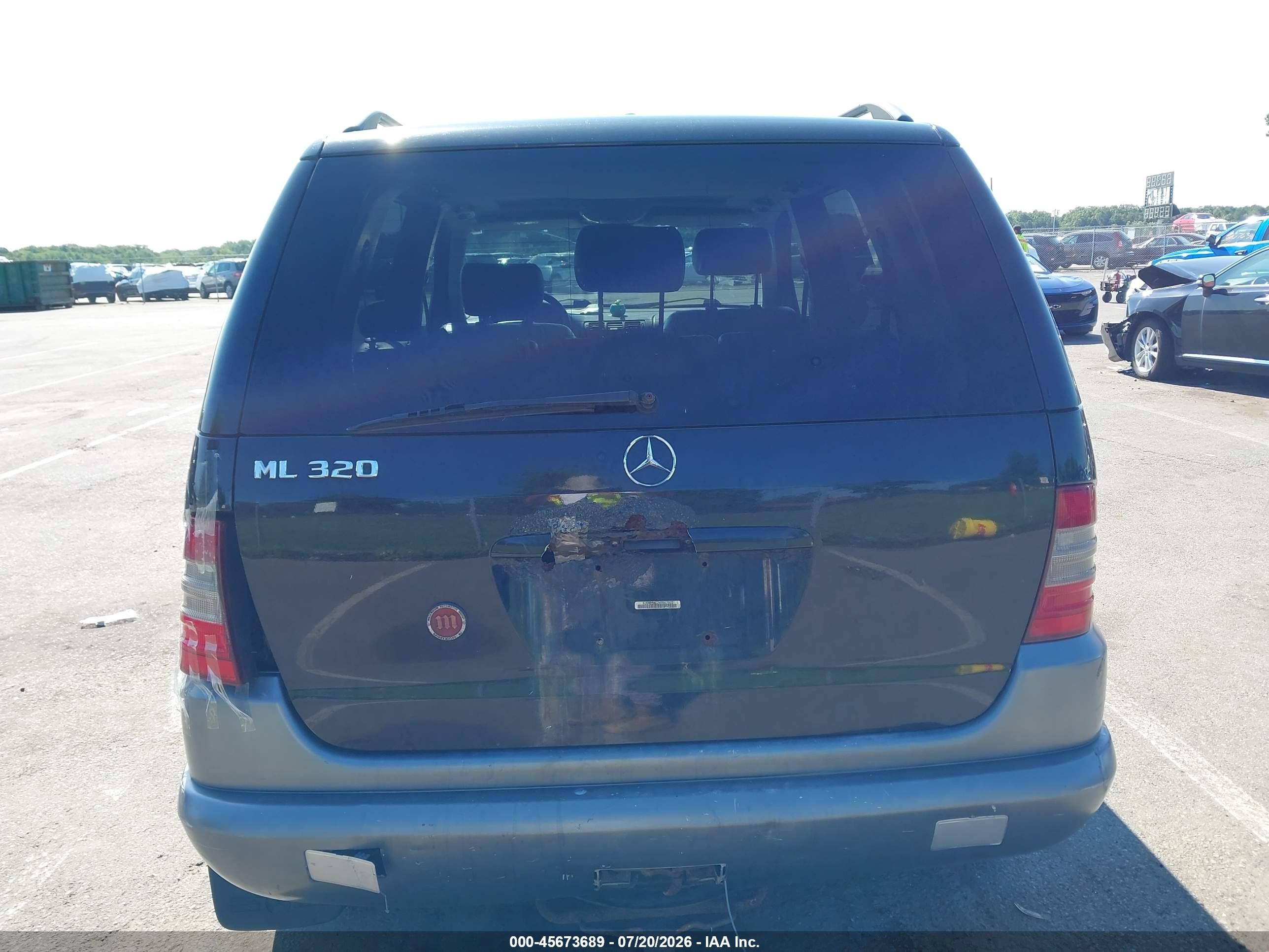 1999 Mercedes-benz Ml 320   Black vin: 4JGAB54E7XA087915