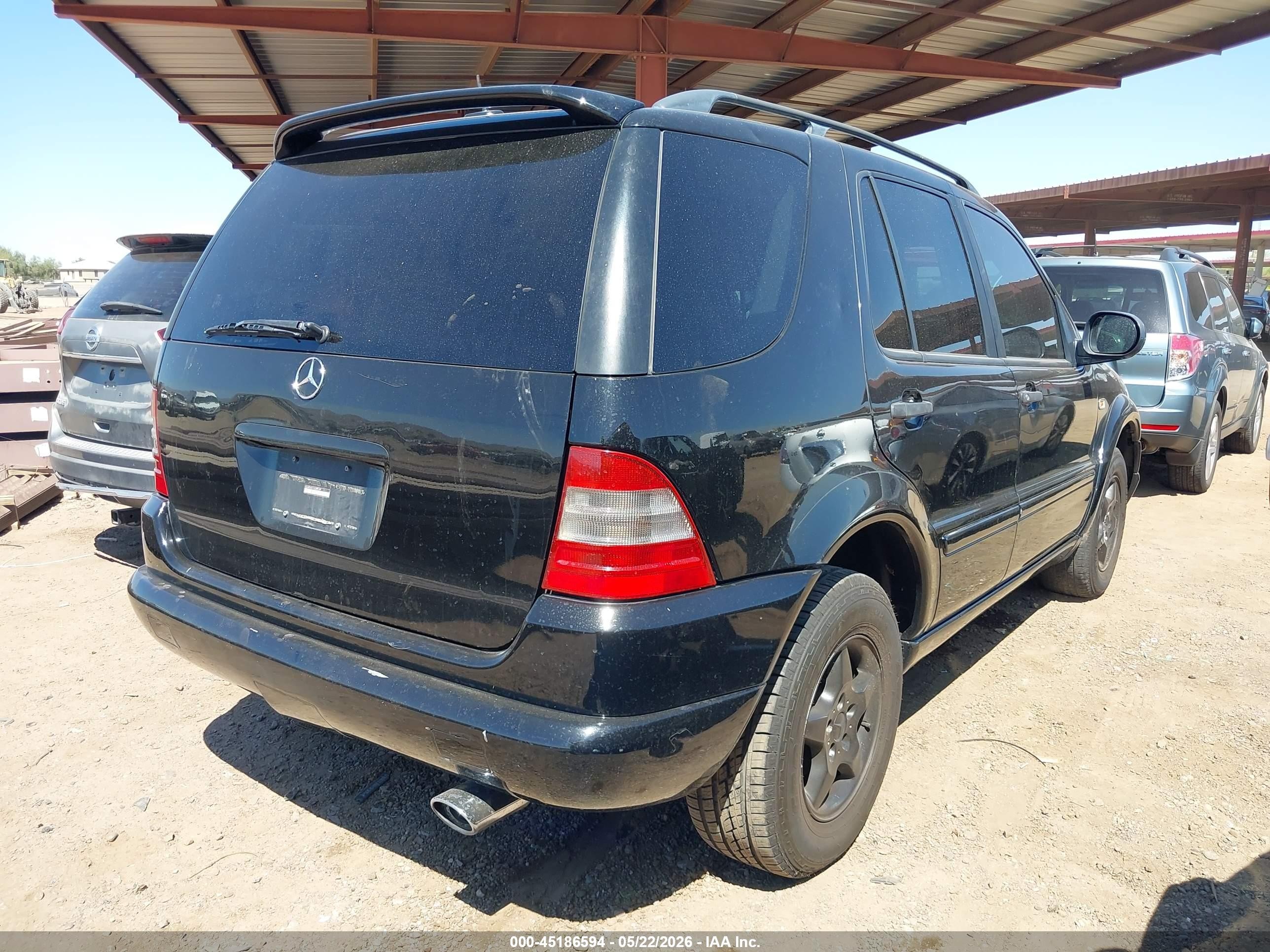 2001 Mercedes-benz Ml 320   Black vin: 4JGAB54E91A288139