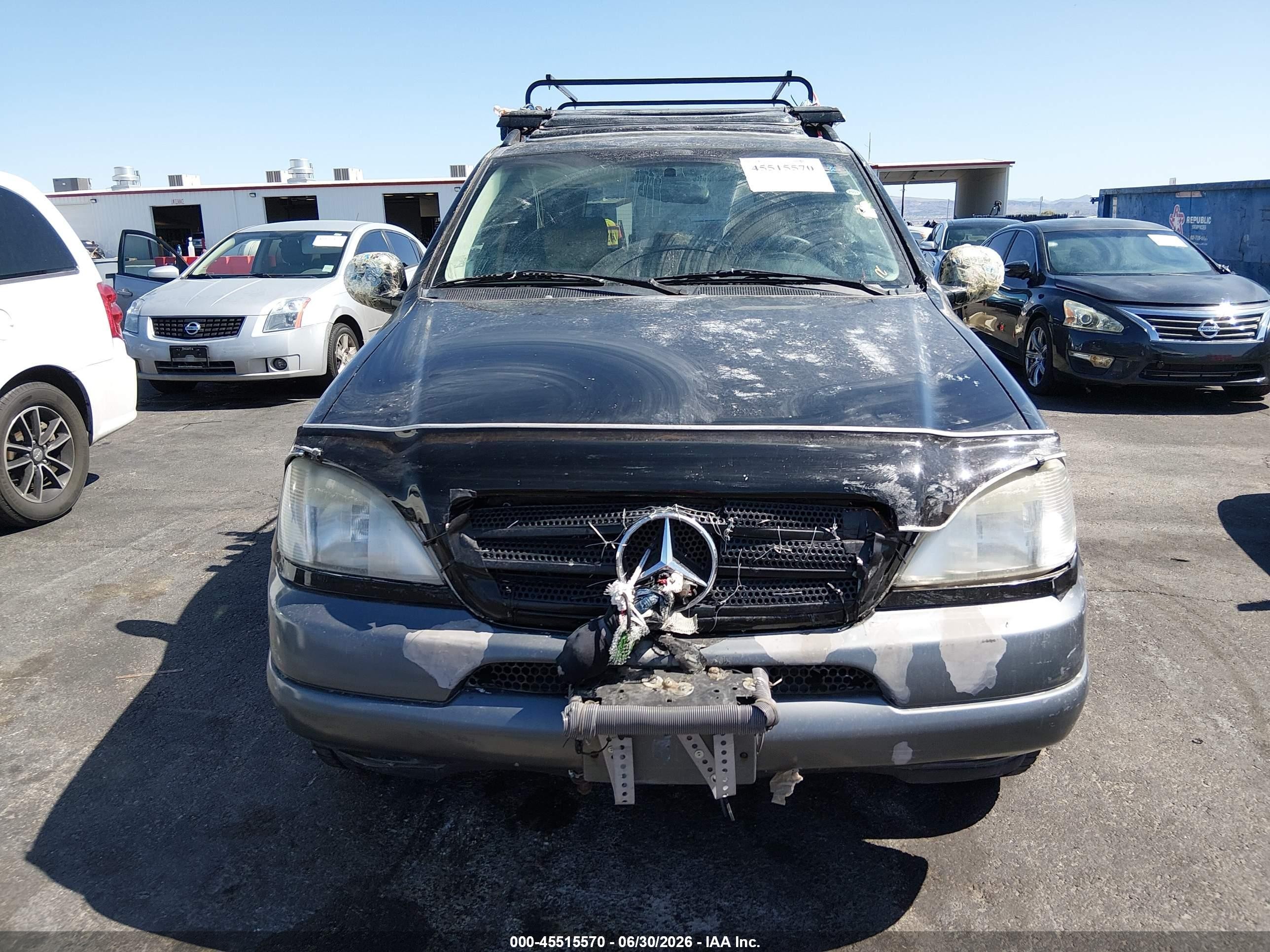 1999 Mercedes-benz Ml 320   Black vin: 4JGAB54E9XA057010