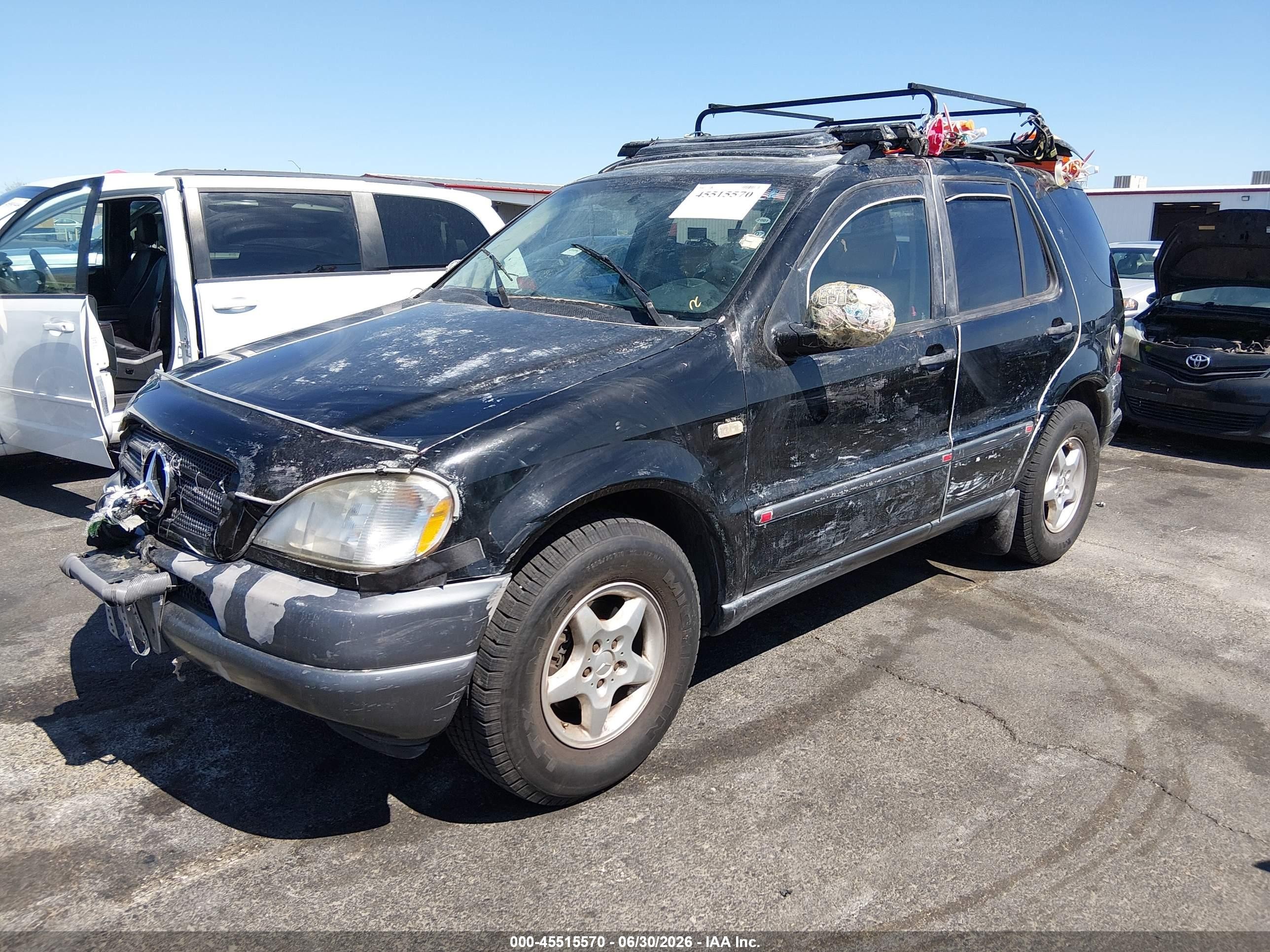 1999 Mercedes-benz Ml 320   Black vin: 4JGAB54E9XA057010