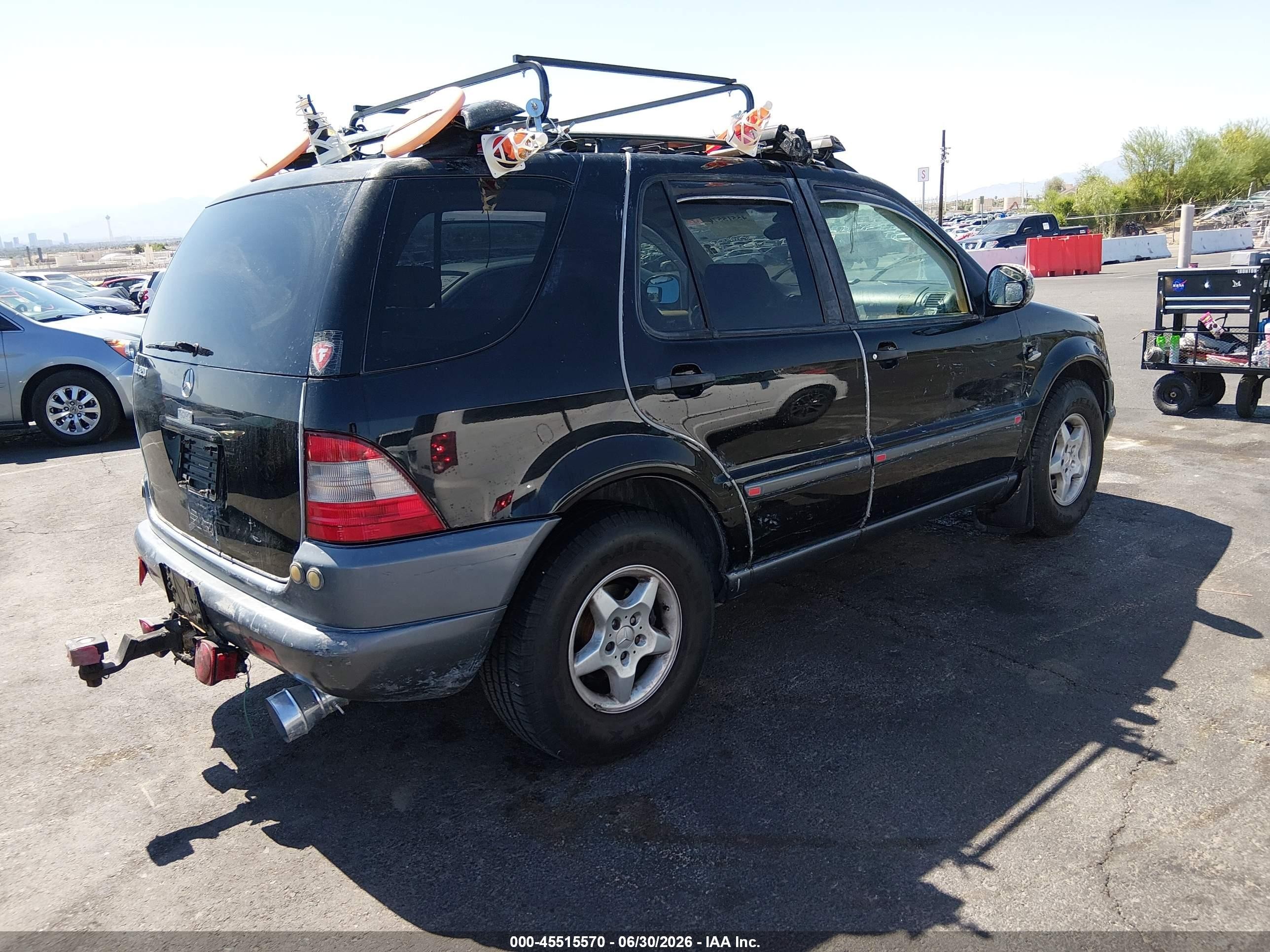 1999 Mercedes-benz Ml 320   Black vin: 4JGAB54E9XA057010