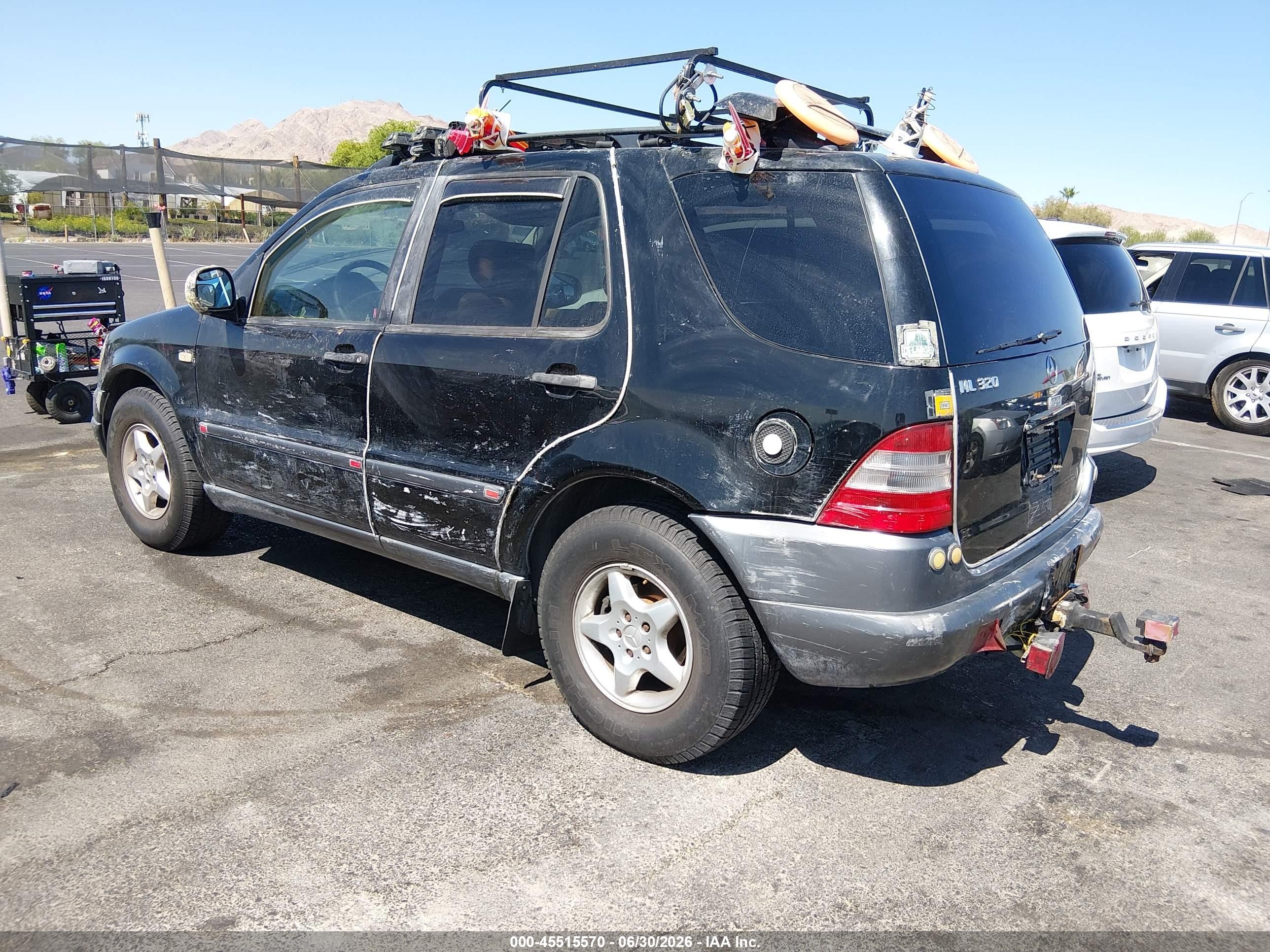 1999 Mercedes-benz Ml 320   Black vin: 4JGAB54E9XA057010