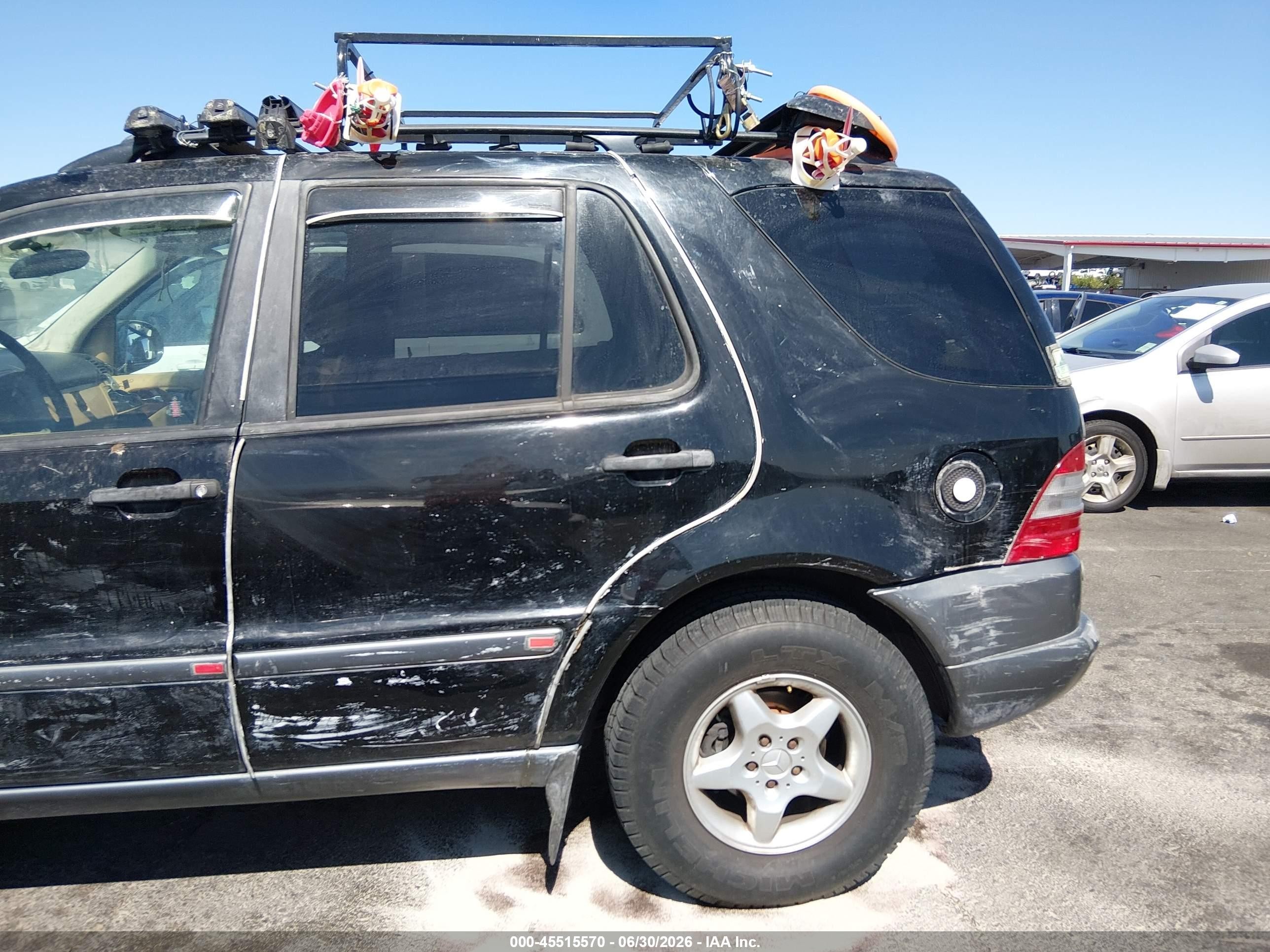 1999 Mercedes-benz Ml 320   Black vin: 4JGAB54E9XA057010