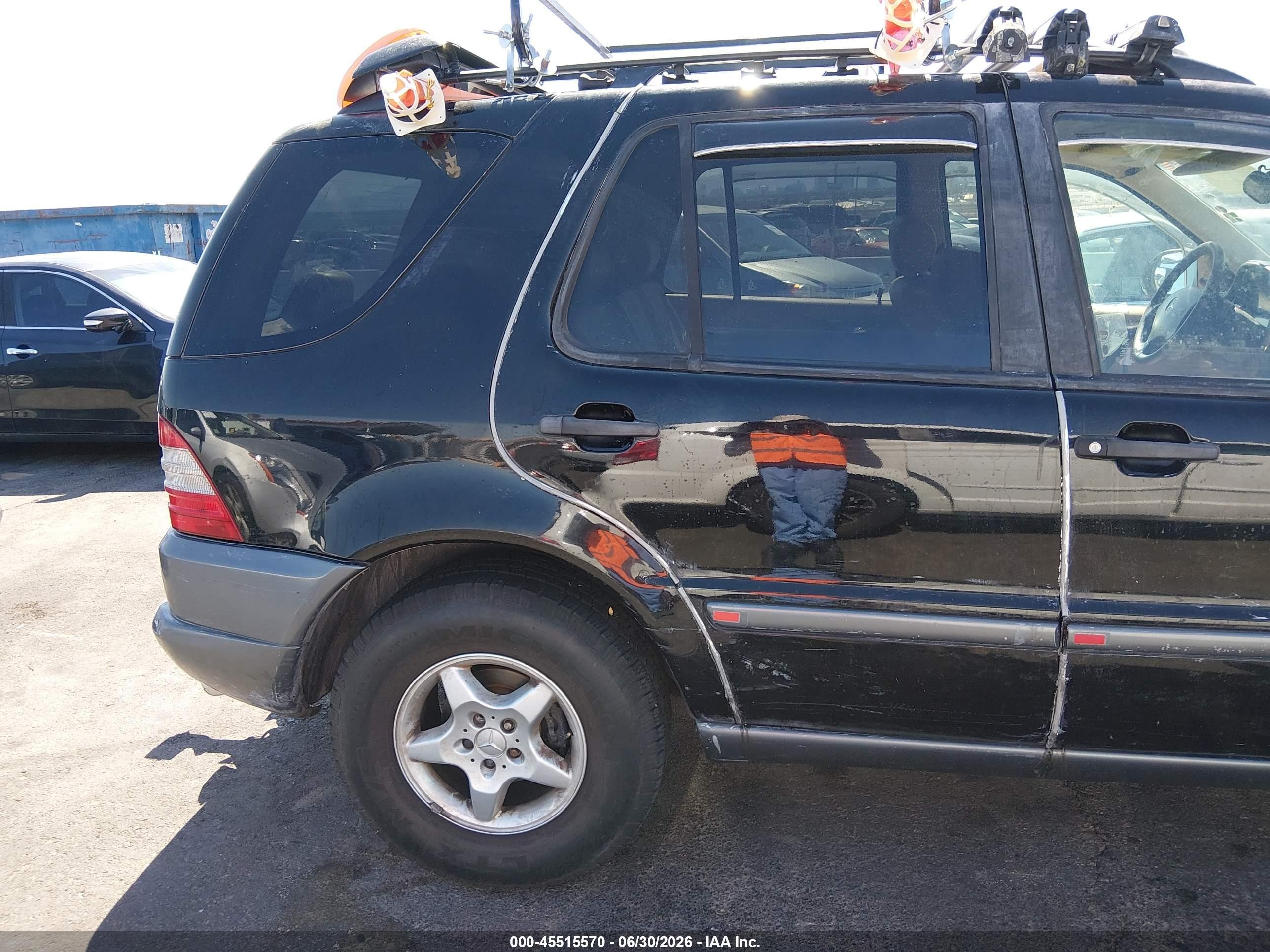 1999 Mercedes-benz Ml 320   Black vin: 4JGAB54E9XA057010