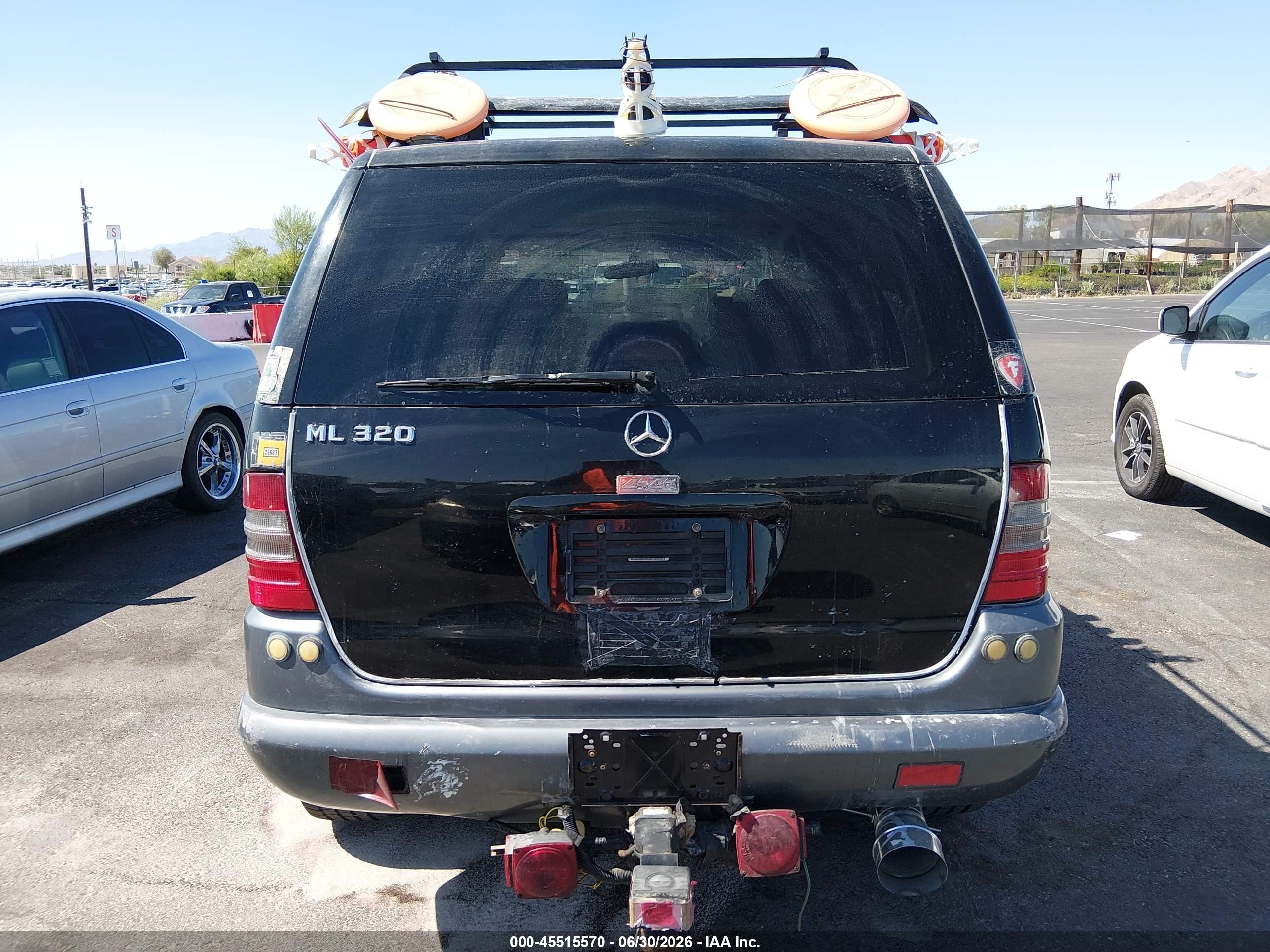 1999 Mercedes-benz Ml 320   Black vin: 4JGAB54E9XA057010