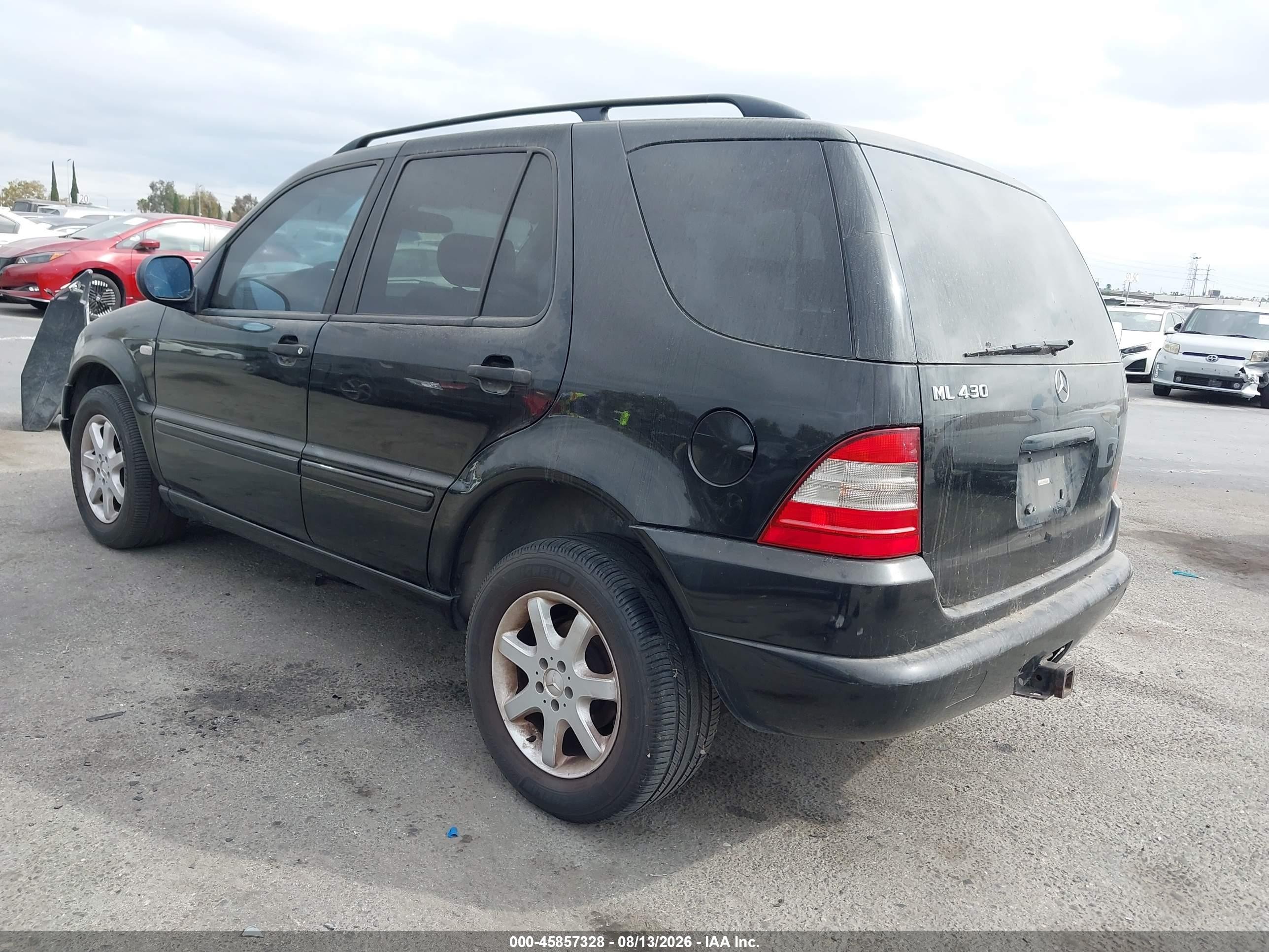 1999 Mercedes-benz Ml 430   Black vin: 4JGAB72E8XA084729
