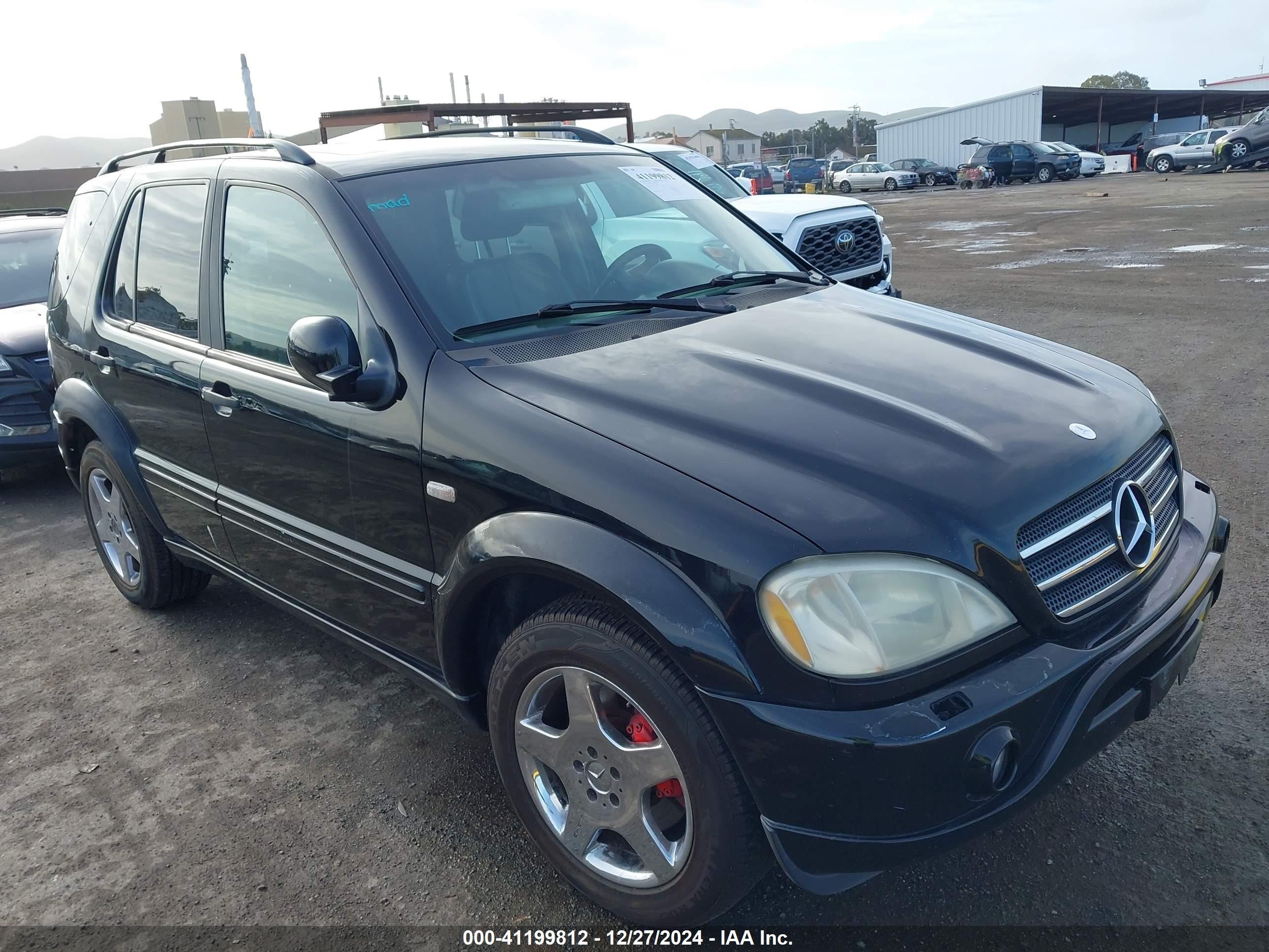 2000 Mercedes-benz Ml 55 Amg   Black vin: 4JGAB74E3YA186258