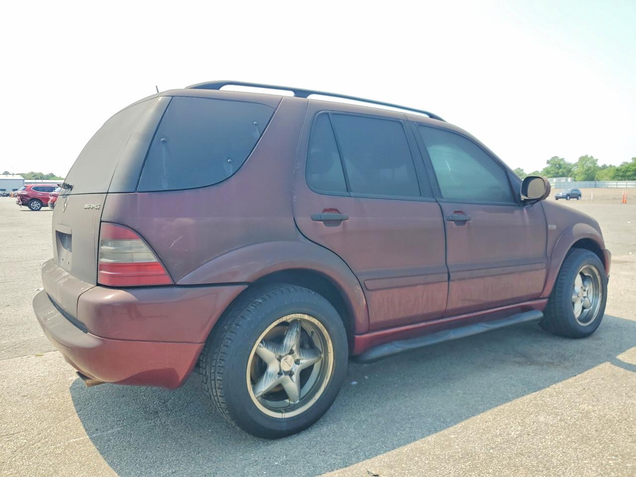 2000 Mercedes-benz Ml 55 Burgundy vin: 4JGAB74E7YA176011