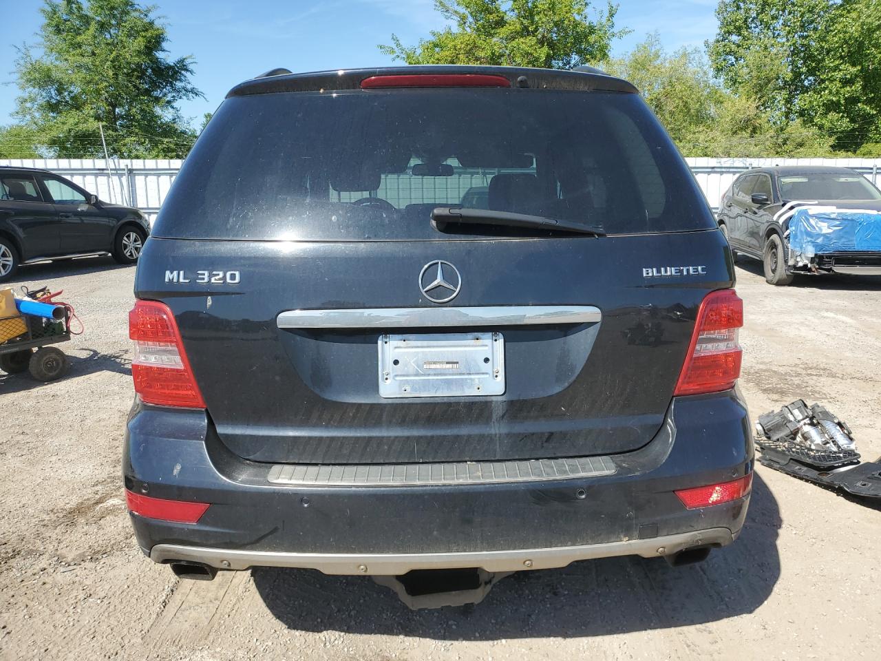 2009 Mercedes-benz Ml Black vin: 4JGBB25E19A482483
