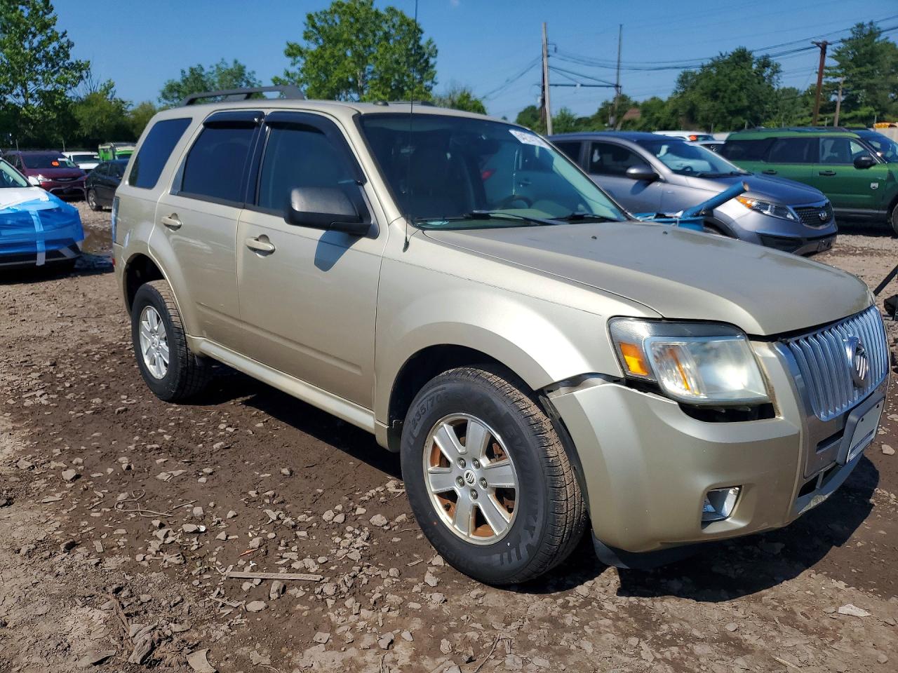 2011 Mercury Mariner Gold vin: 4M2CN8B75BKJ01558