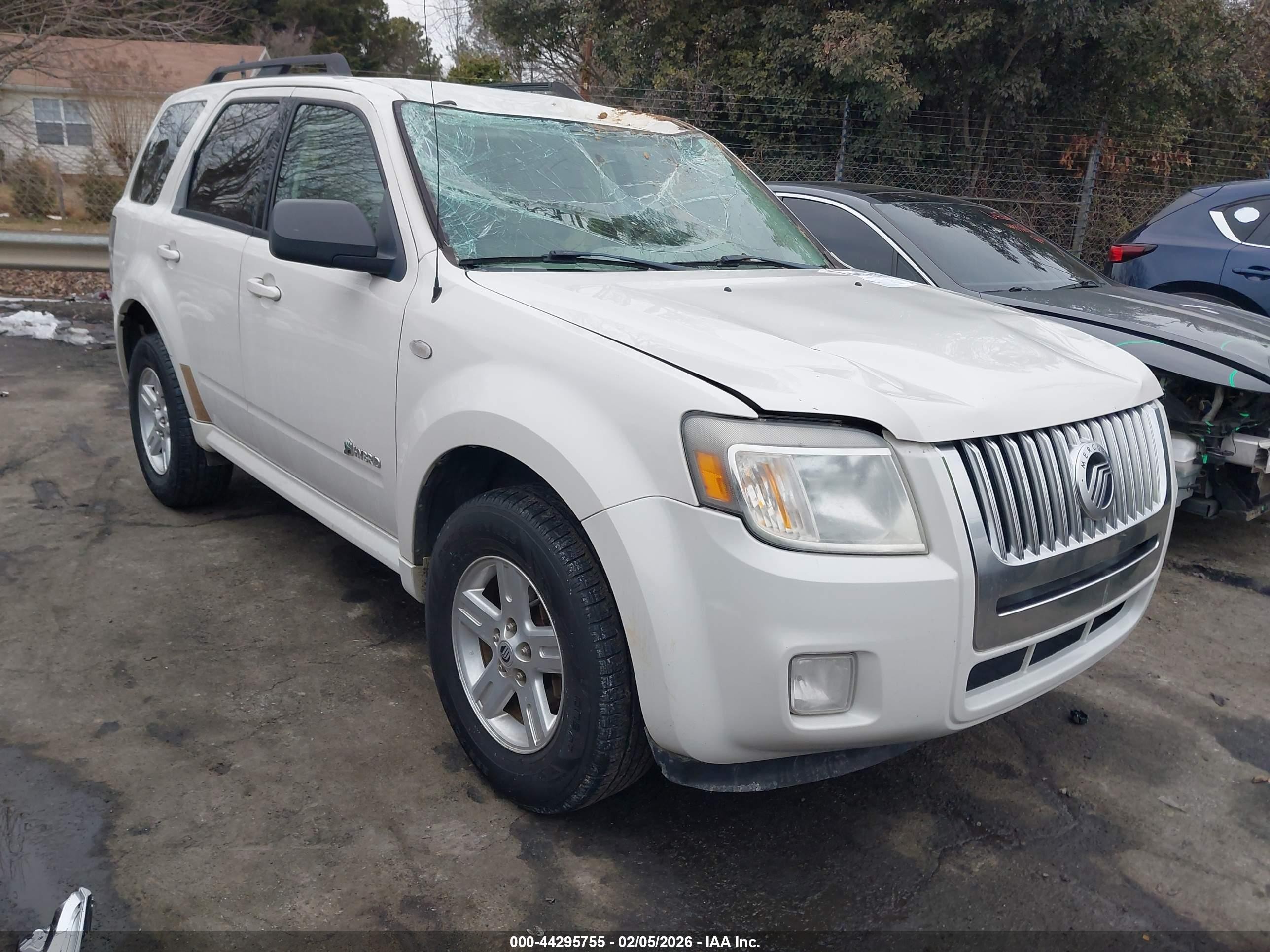 2009 Mercury Mariner Hybrid   White vin: 4M2CU29359KJ09768