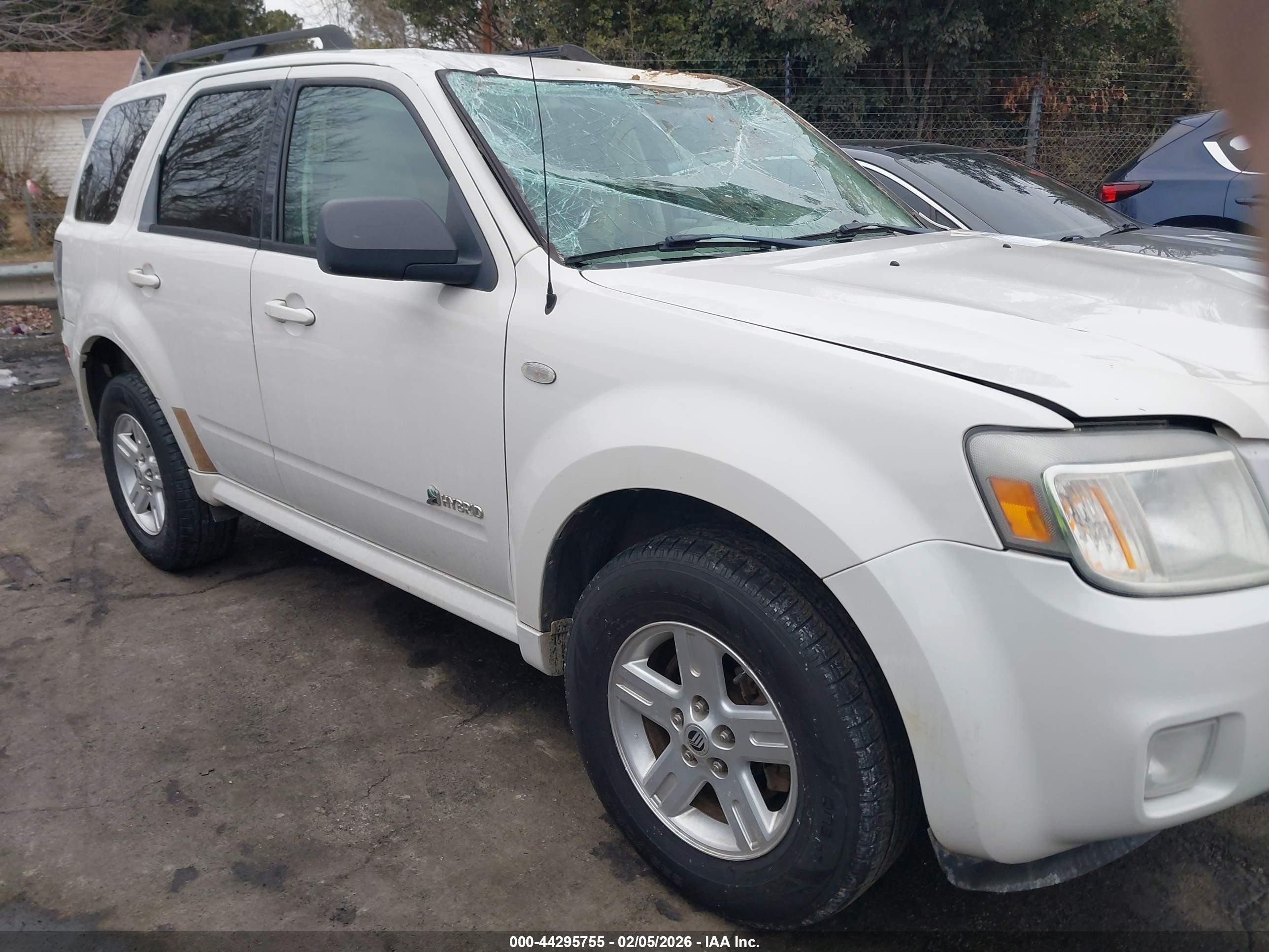 2009 Mercury Mariner Hybrid   White vin: 4M2CU29359KJ09768