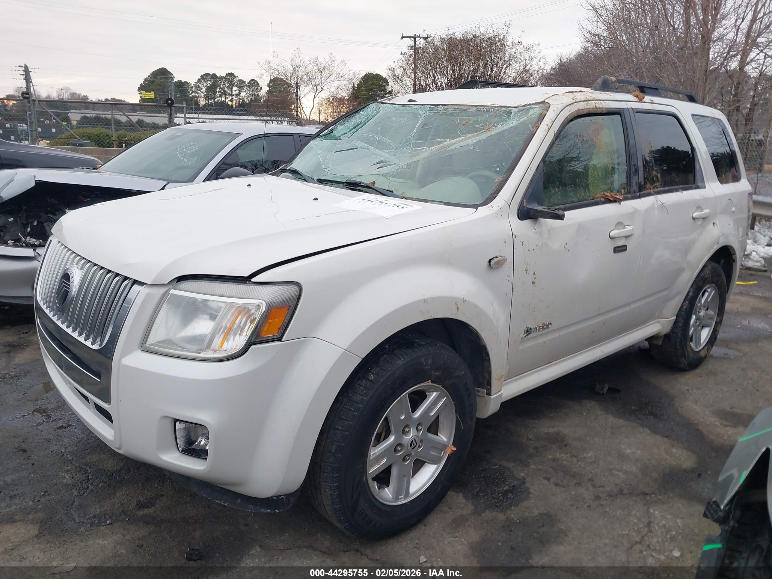 2009 Mercury Mariner Hybrid   White vin: 4M2CU29359KJ09768