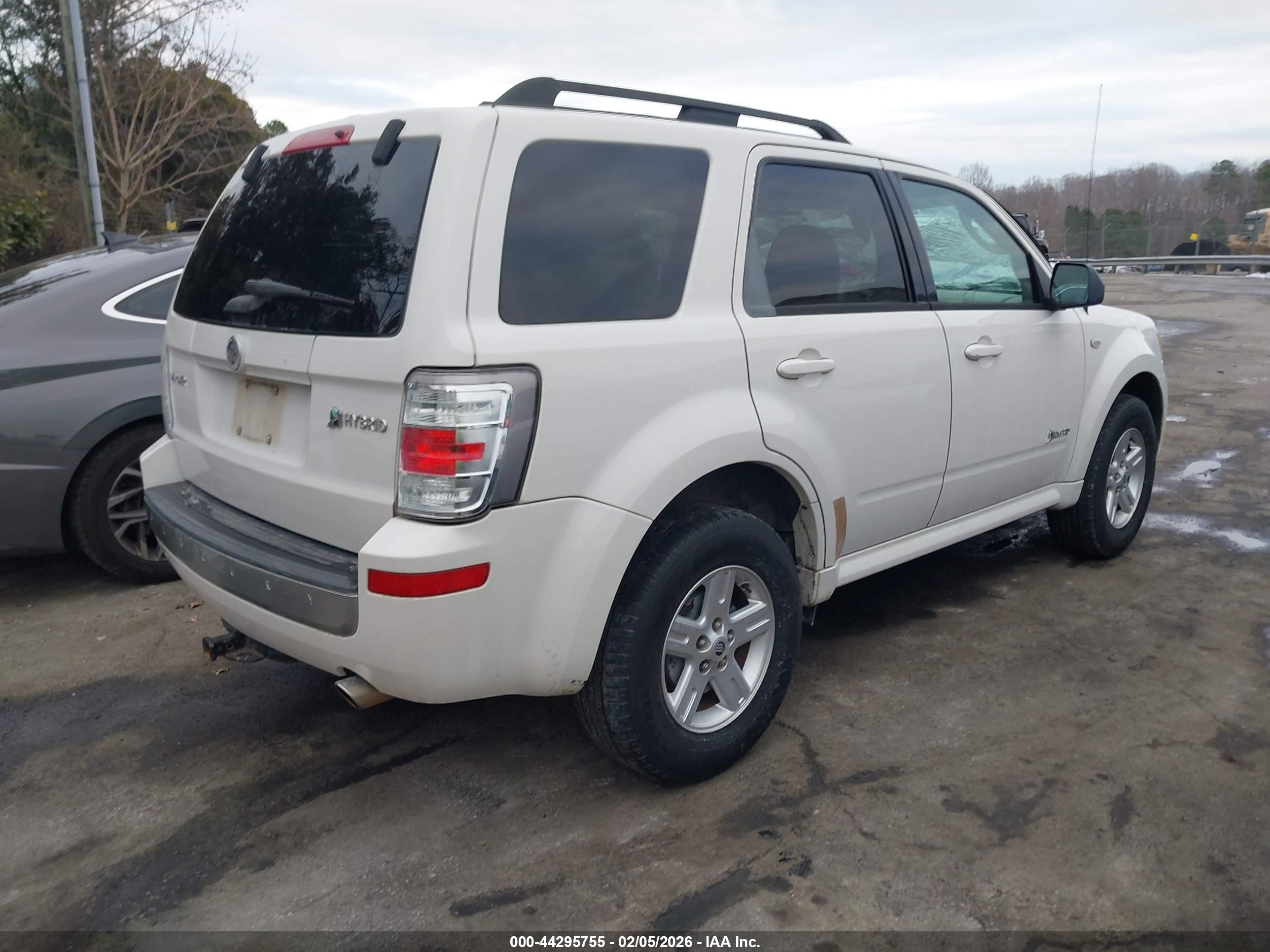 2009 Mercury Mariner Hybrid   White vin: 4M2CU29359KJ09768