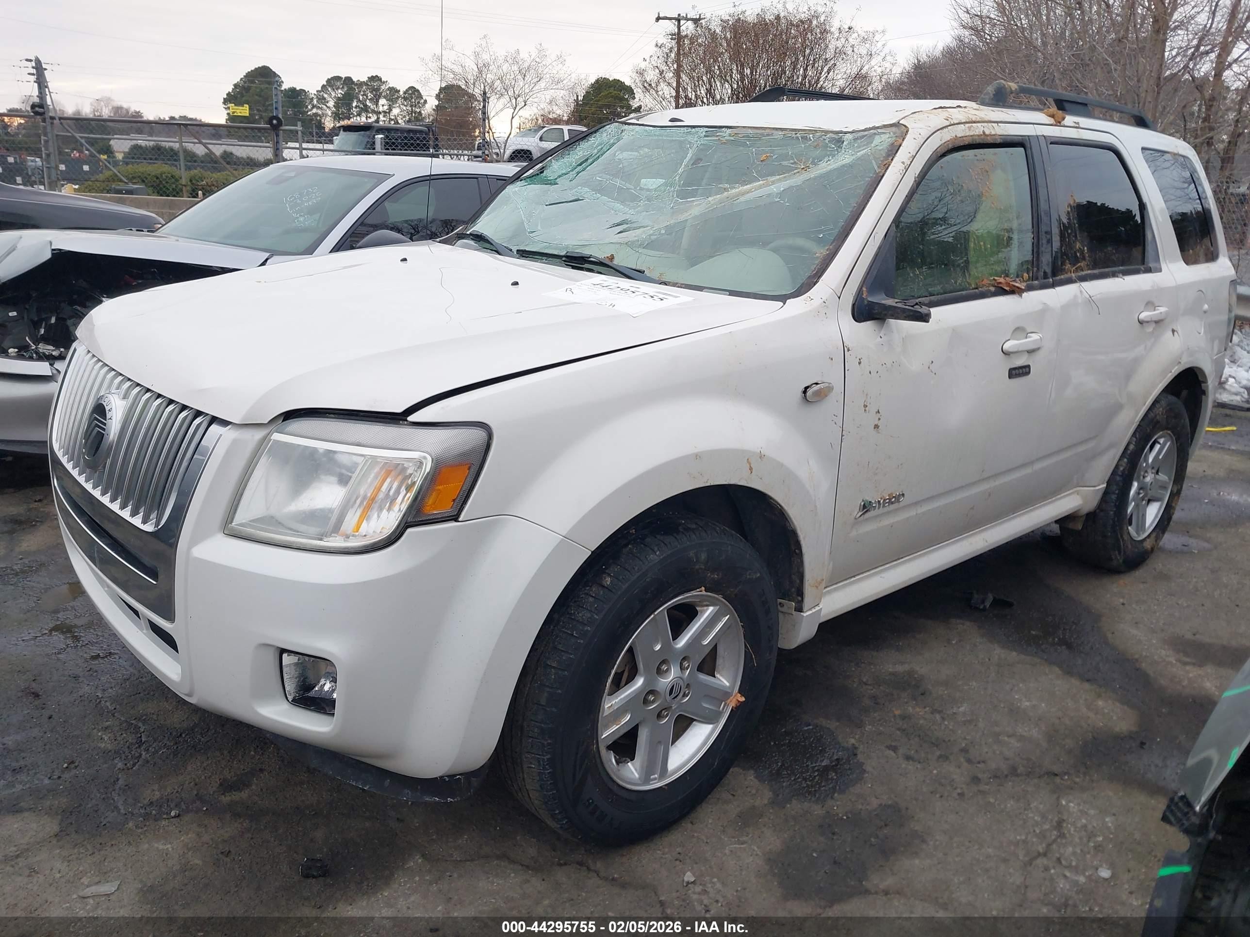 2009 Mercury Mariner Hybrid   White vin: 4M2CU29359KJ09768