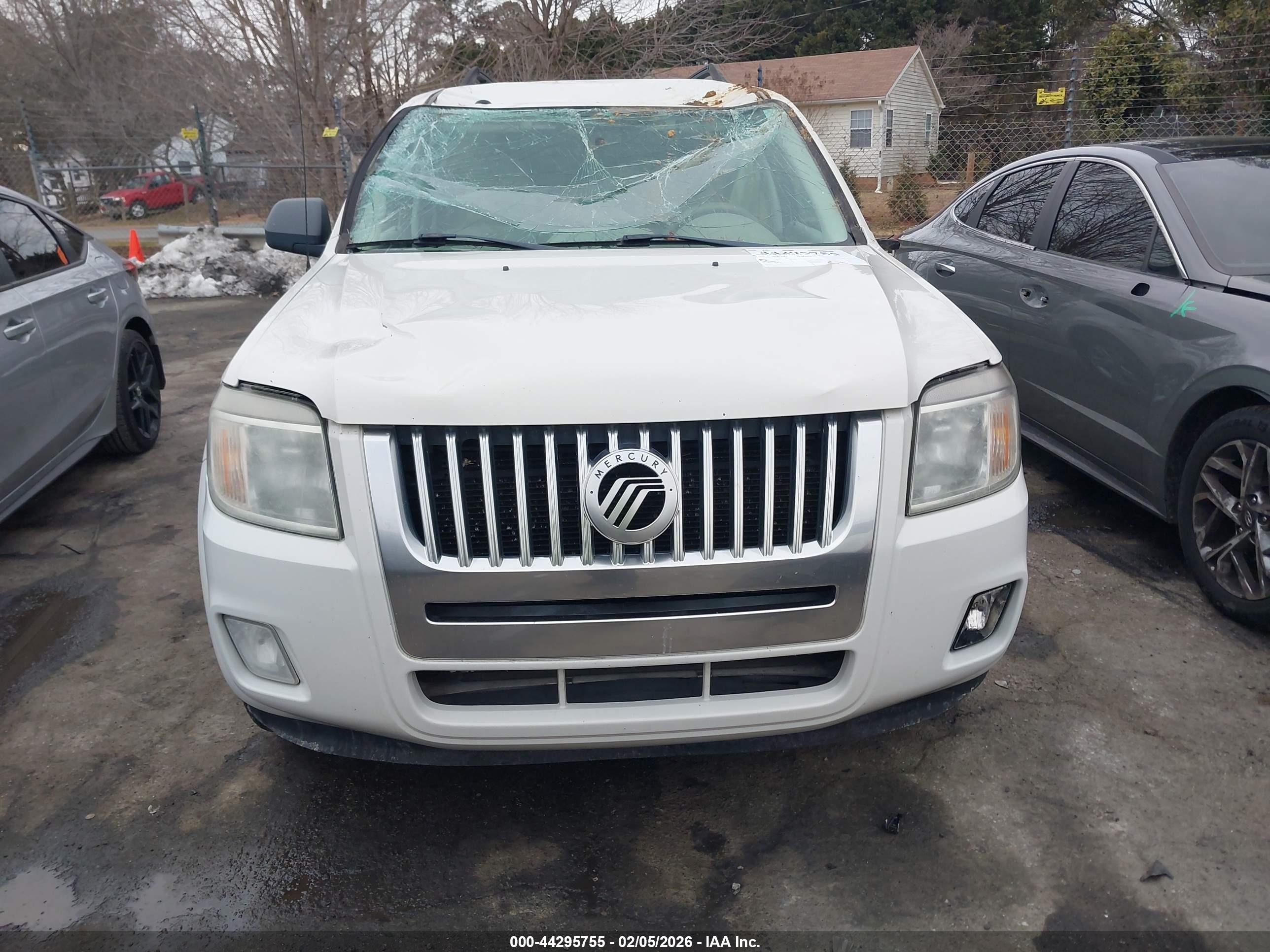 2009 Mercury Mariner Hybrid   White vin: 4M2CU29359KJ09768
