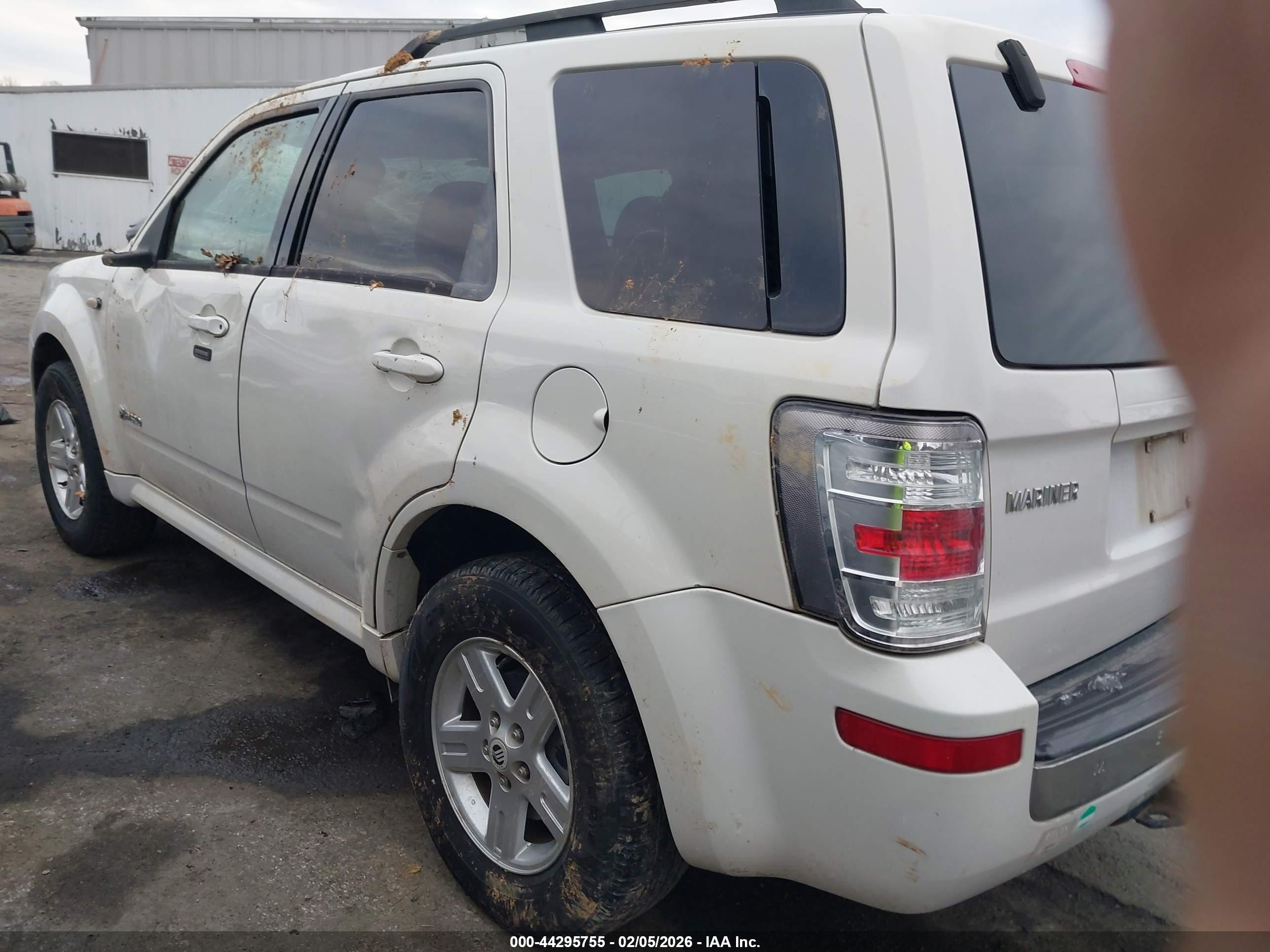 2009 Mercury Mariner Hybrid   White vin: 4M2CU29359KJ09768