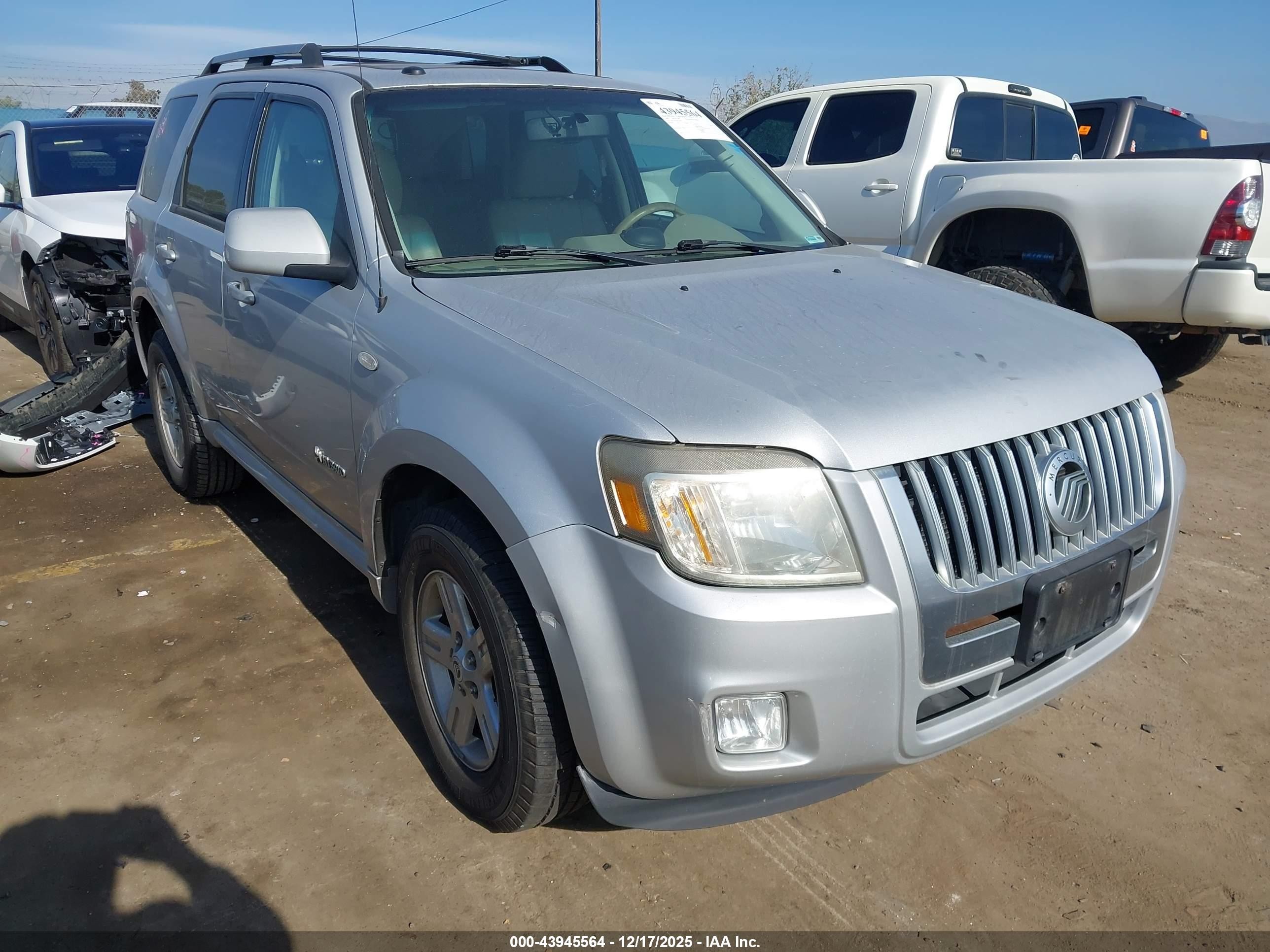 2009 Mercury Mariner Hybrid   Silver vin: 4M2CU293X9KJ20913