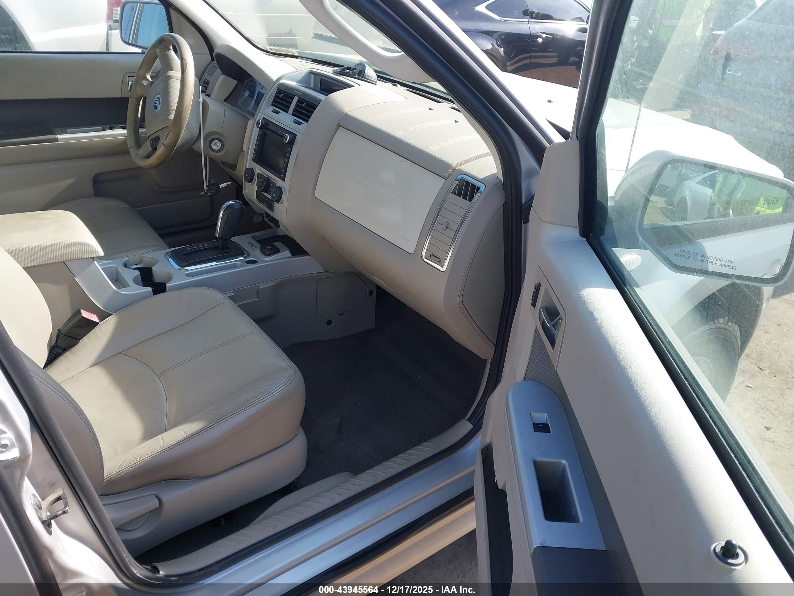 2009 Mercury Mariner Hybrid   Silver vin: 4M2CU293X9KJ20913