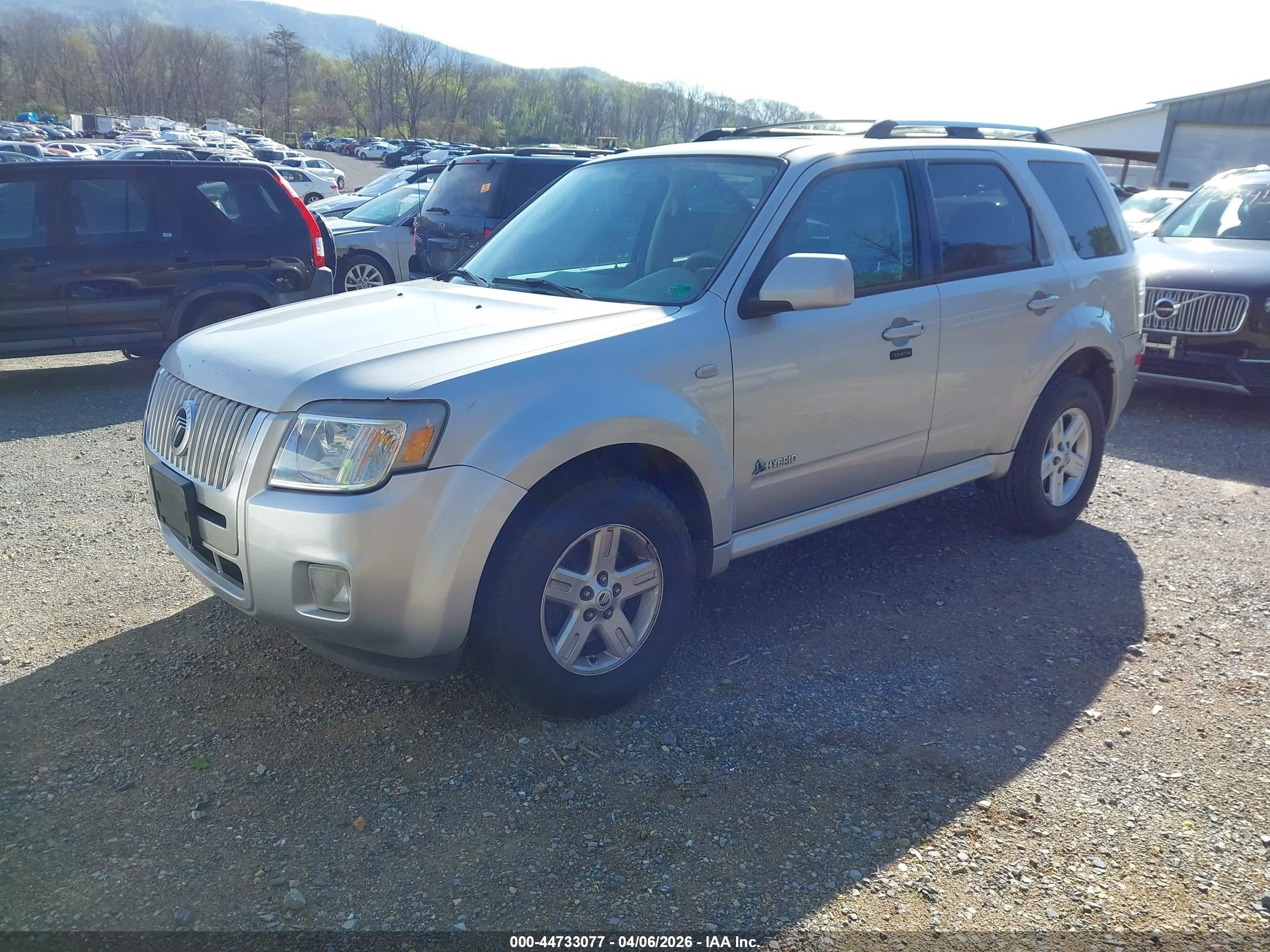 2009 Mercury Mariner Hybrid   Silver vin: 4M2CU39369KJ09851