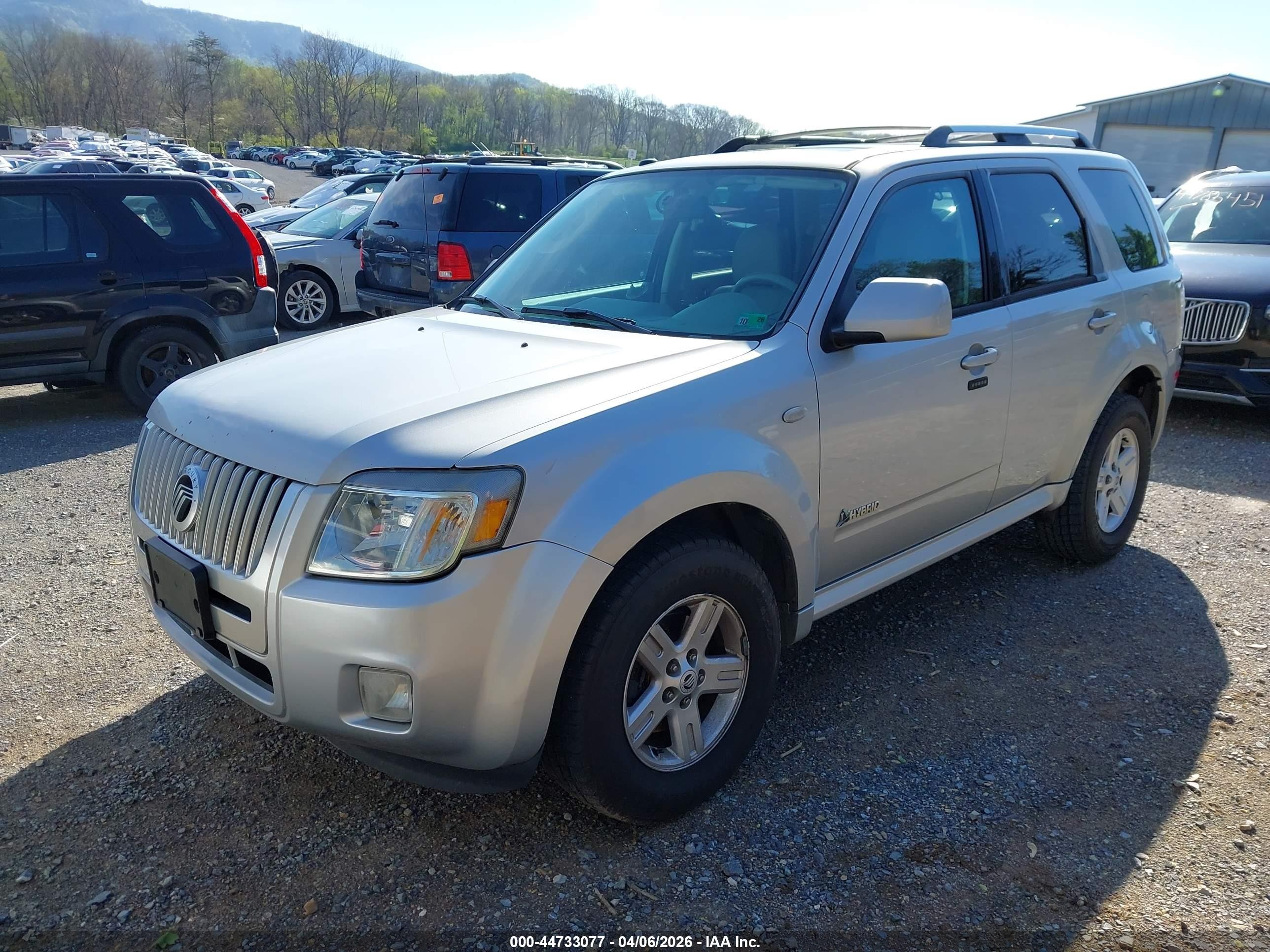 2009 Mercury Mariner Hybrid   Silver vin: 4M2CU39369KJ09851