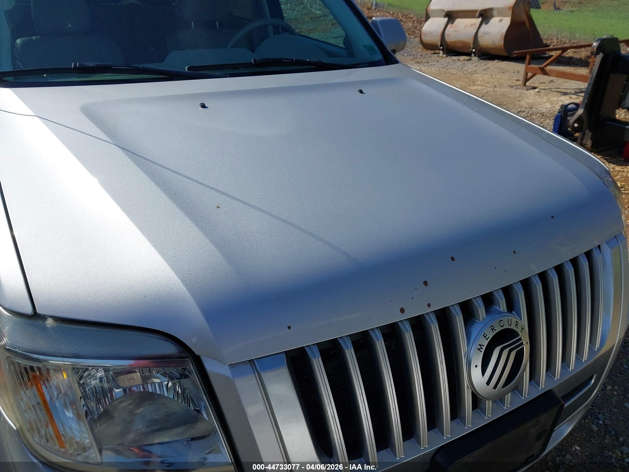 2009 Mercury Mariner Hybrid   Silver vin: 4M2CU39369KJ09851