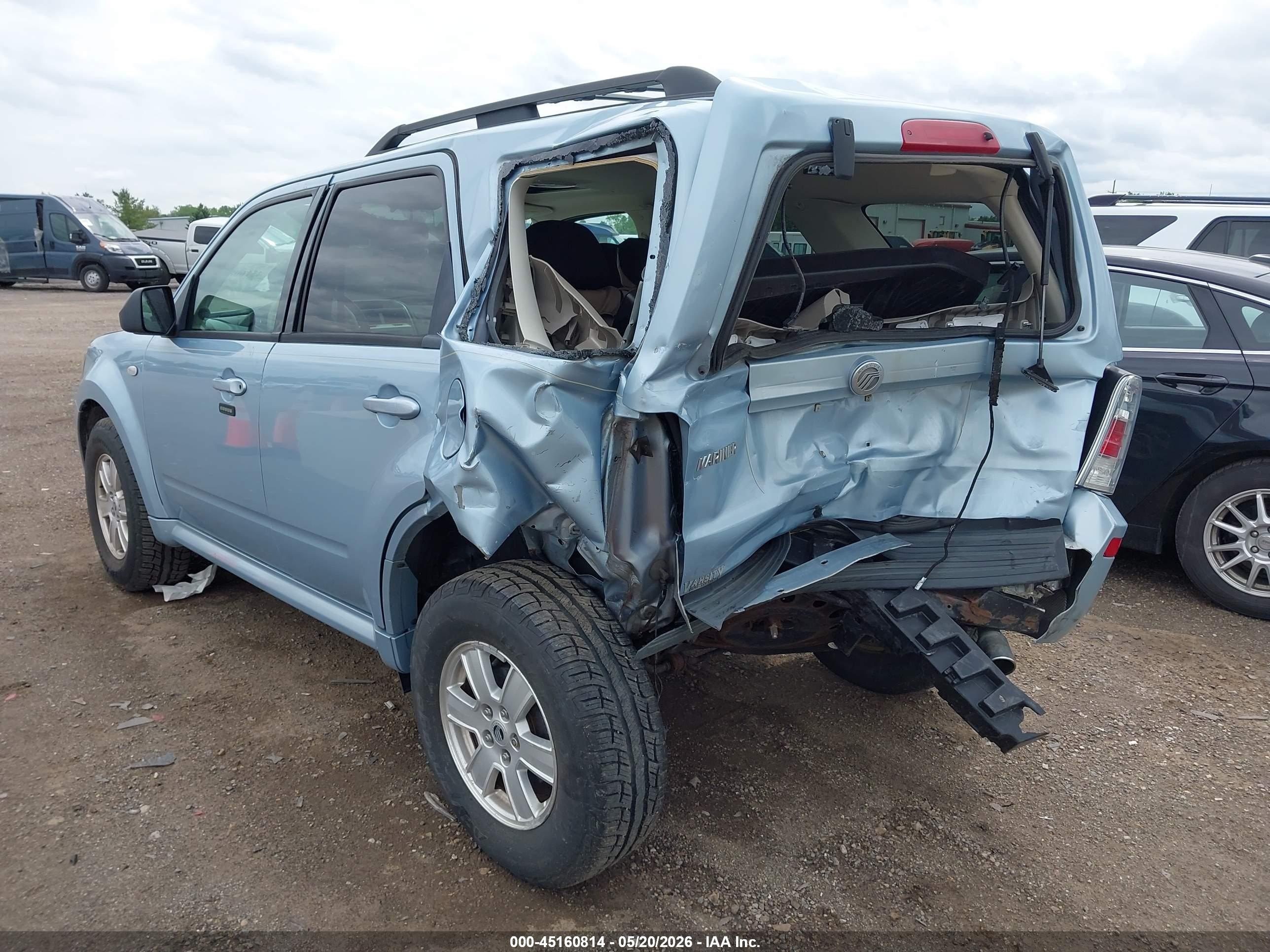 2009 Mercury Mariner I4 Light Blue vin: 4M2CU81759KJ18049