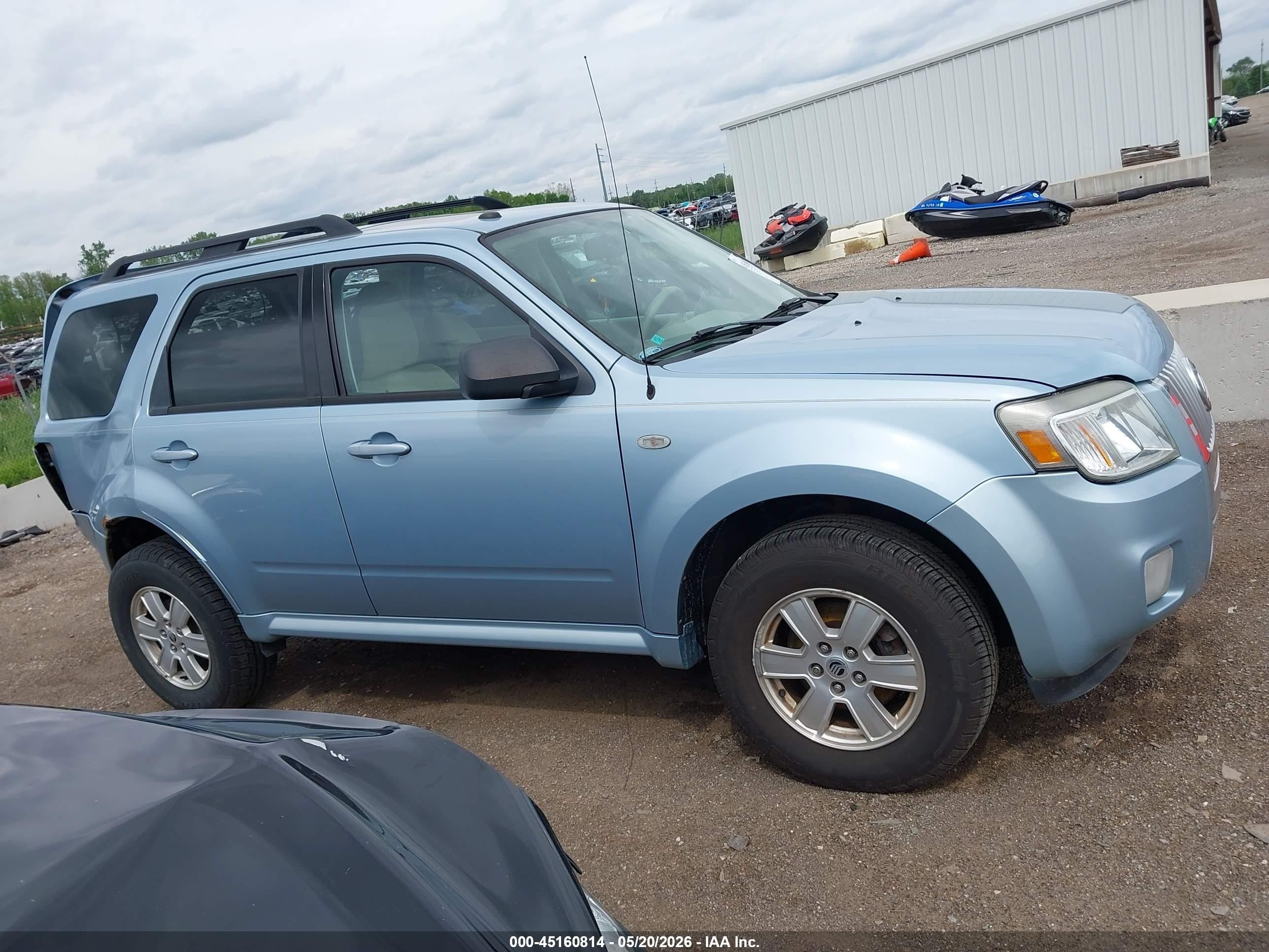 2009 Mercury Mariner I4 Light Blue vin: 4M2CU81759KJ18049