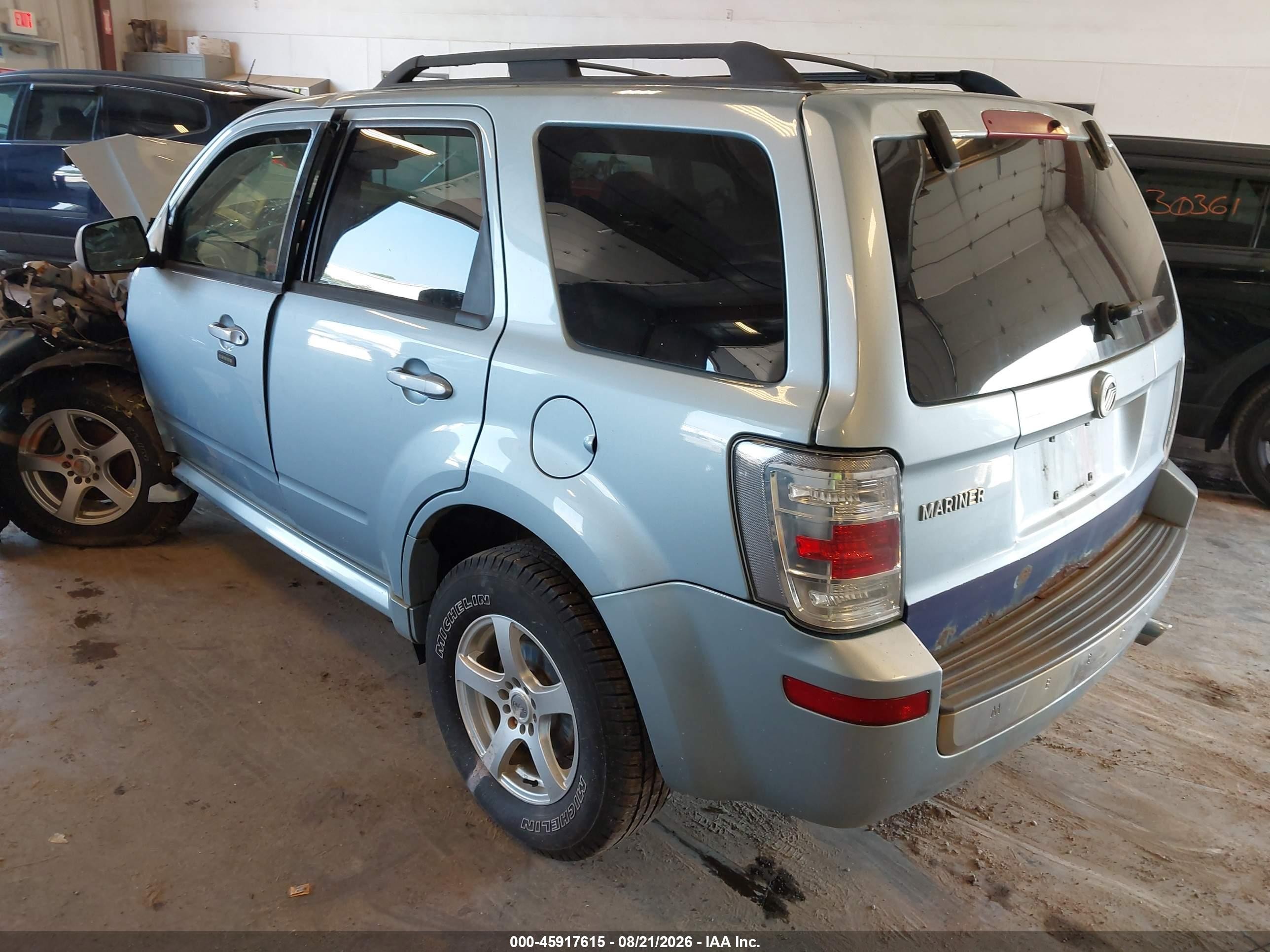 2009 Mercury Mariner I4 Light Blue vin: 4M2CU81779KJ17145