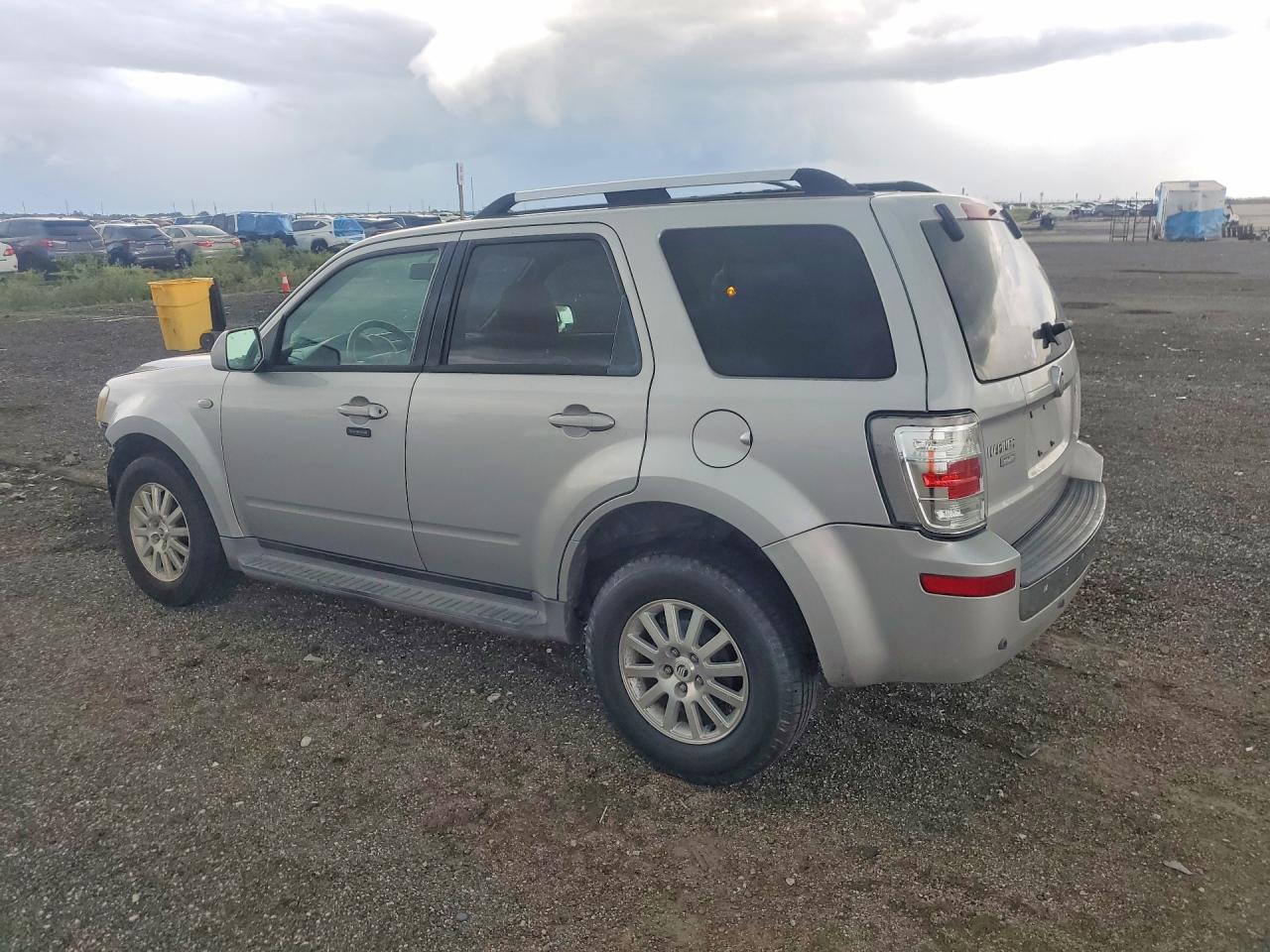 2009 Mercury Mariner Premier Silver vin: 4M2CU97719KJ16909