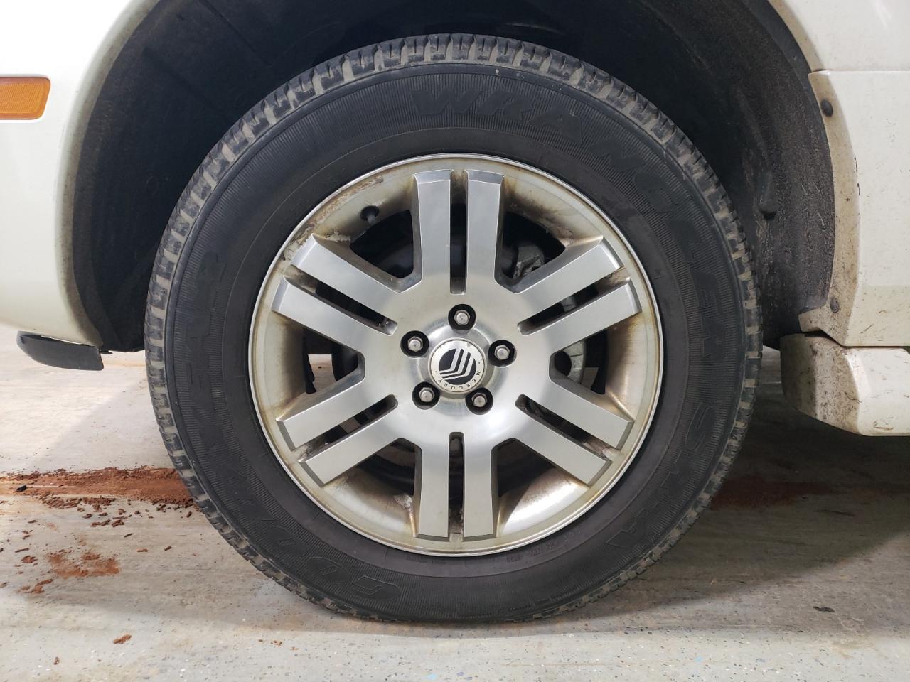 2009 Mercury Mountaineer Premier Кремовый vin: 4M2EU48869UJ00227 Damage: Left Front Wheel, Corrosion, 6 To 7 Inches