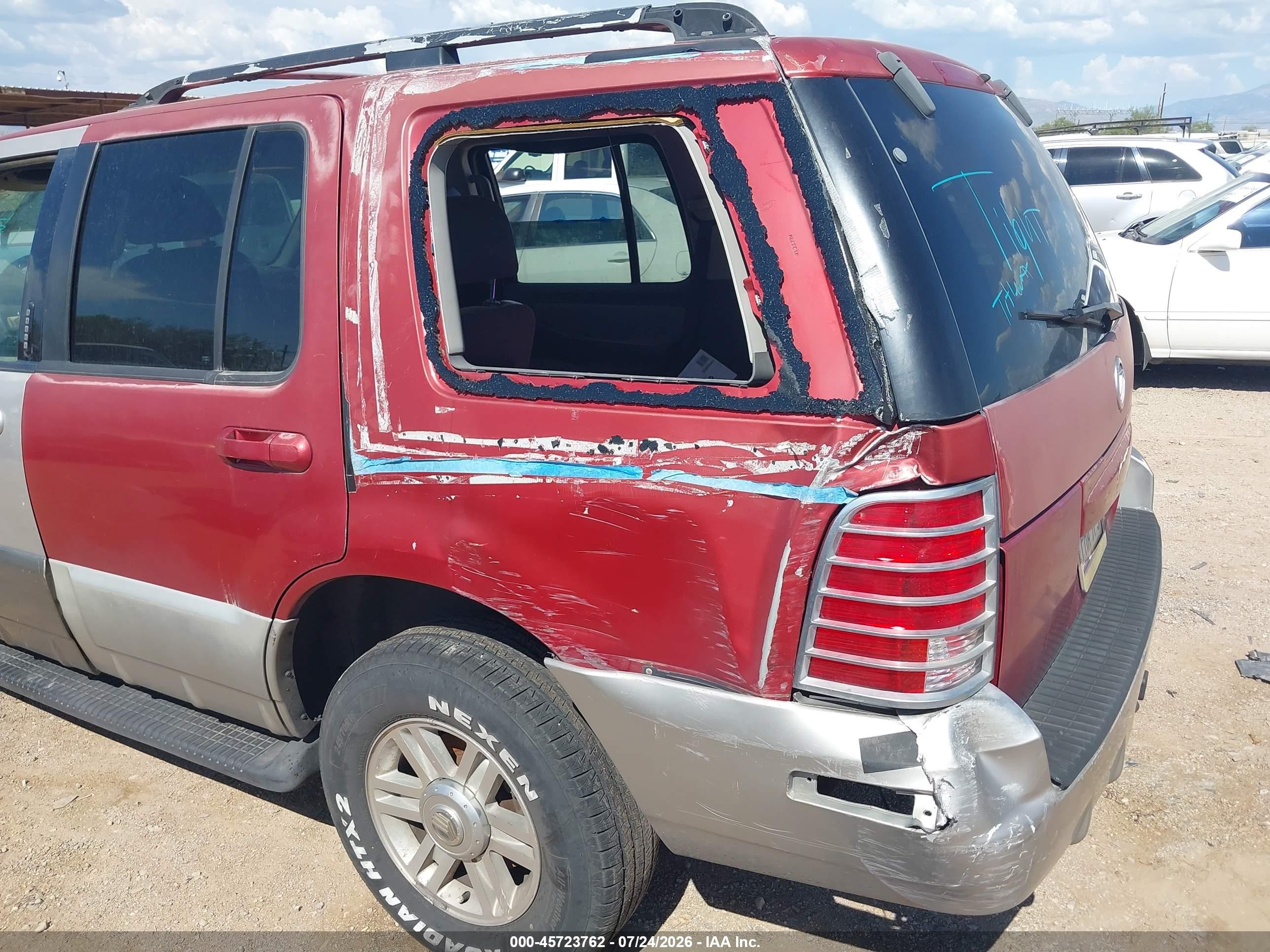 2002 Mercury Mountaineer   Red vin: 4M2ZU66E92ZJ06909