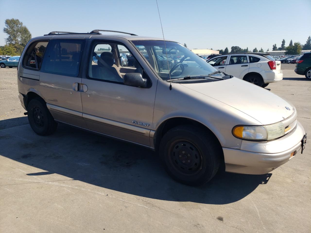 1995 Nissan Quest Xe Tan vin: 4N2DN11WXSD810322
