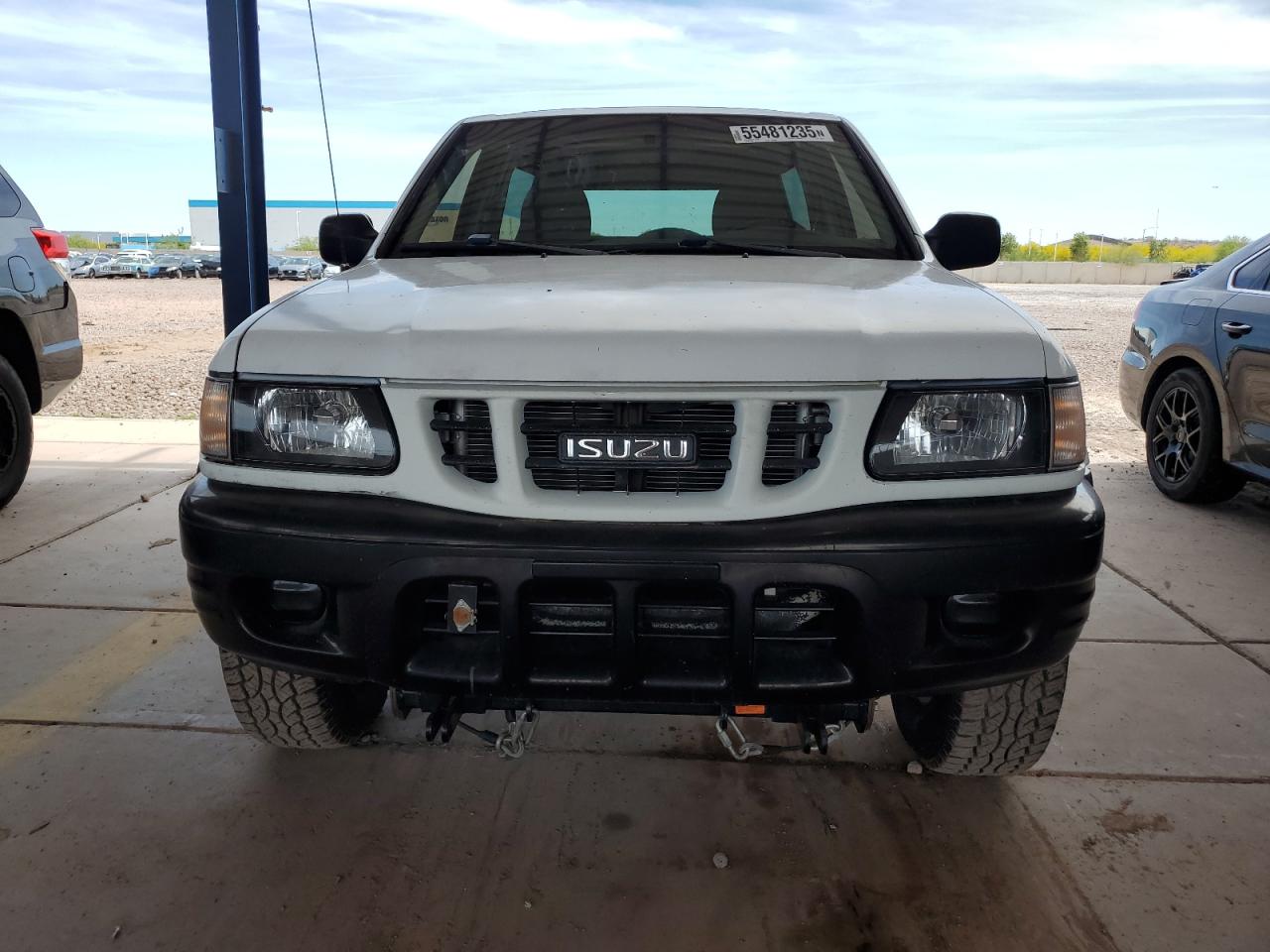 2000 Isuzu Amigo  White vin: 4S2CK57D1Y4348024