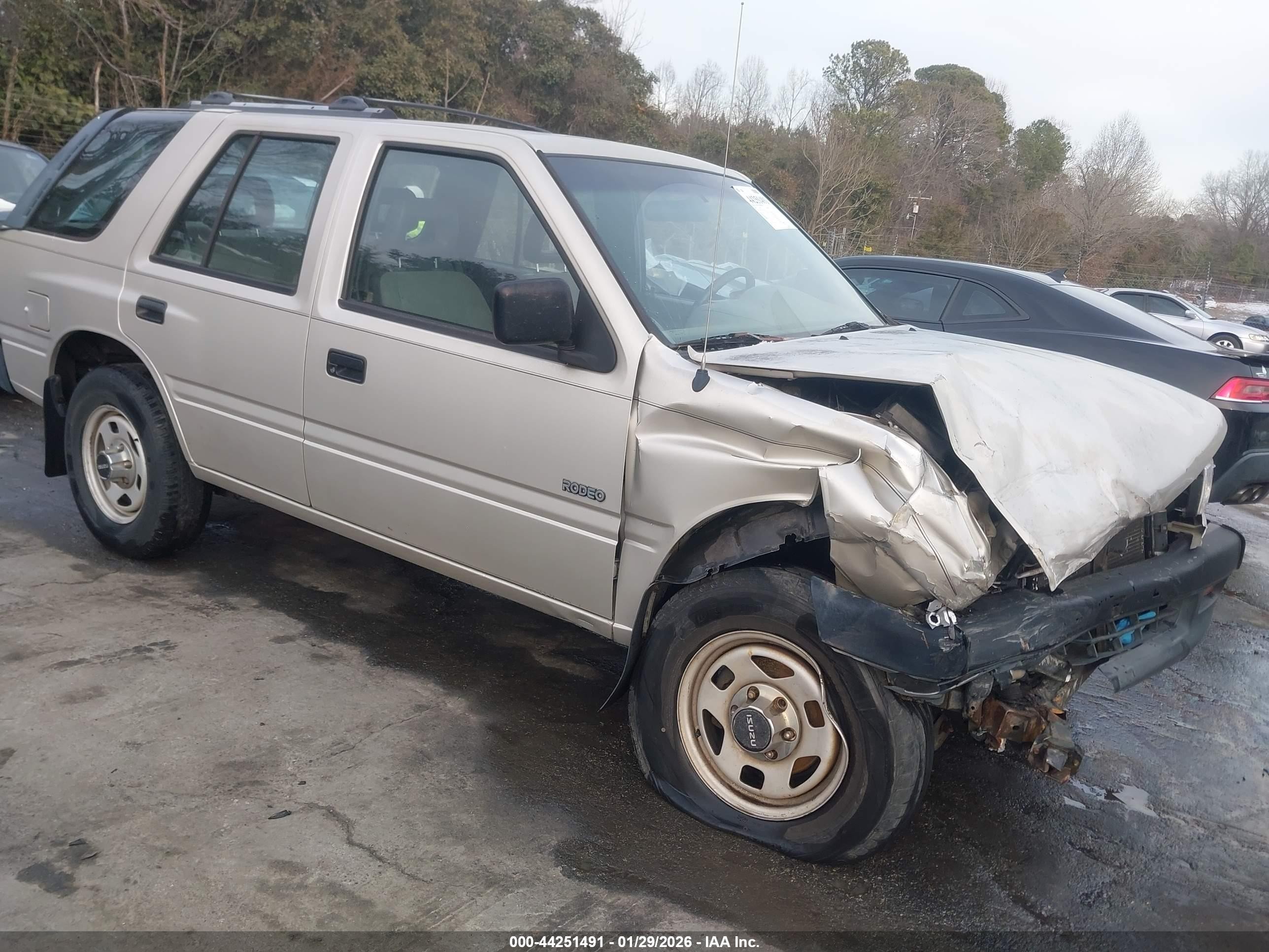 1997 Isuzu Rodeo S 2.6l Tan vin: 4S2CK58E5V4322383