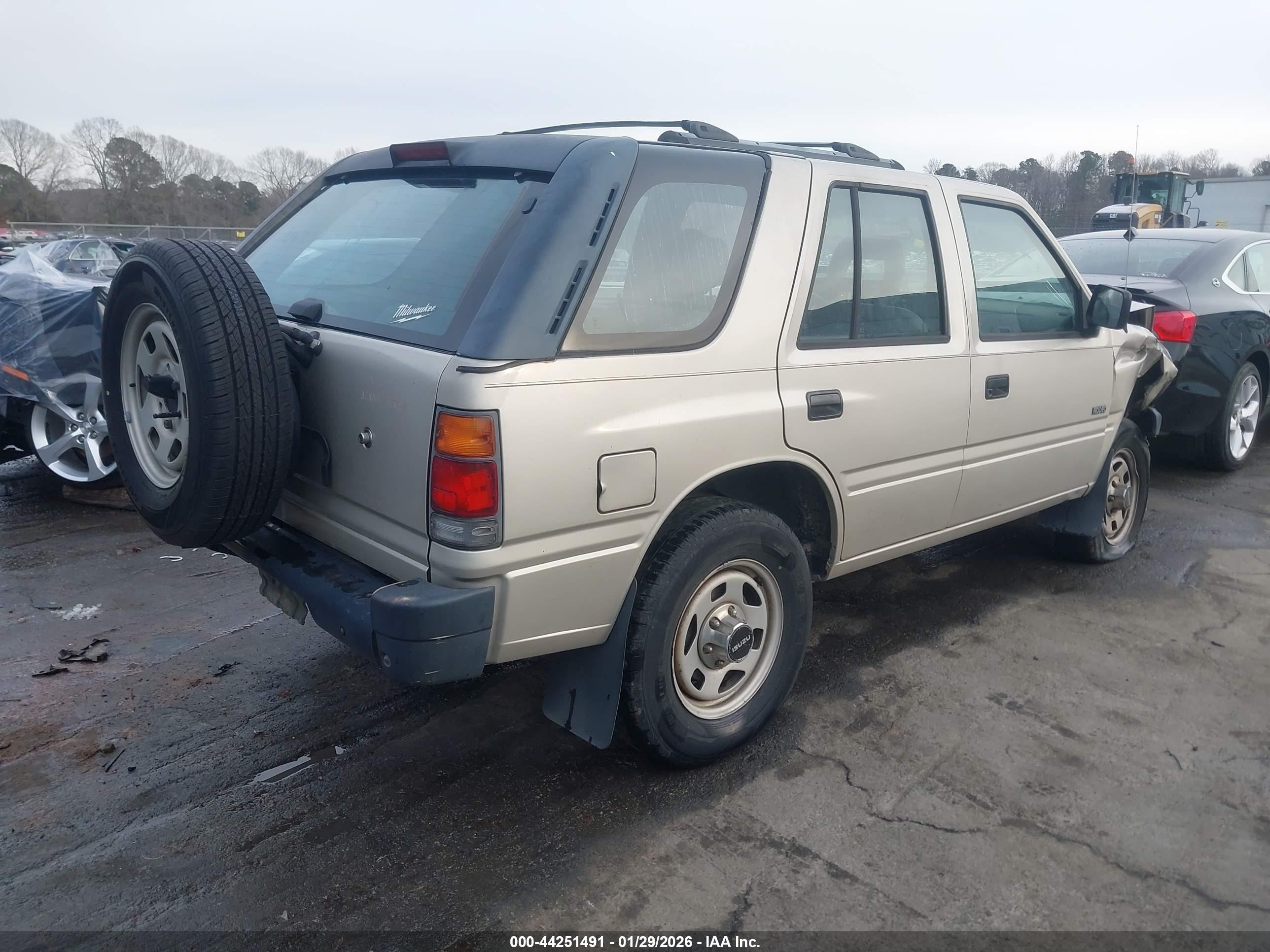 1997 Isuzu Rodeo S 2.6l Tan vin: 4S2CK58E5V4322383