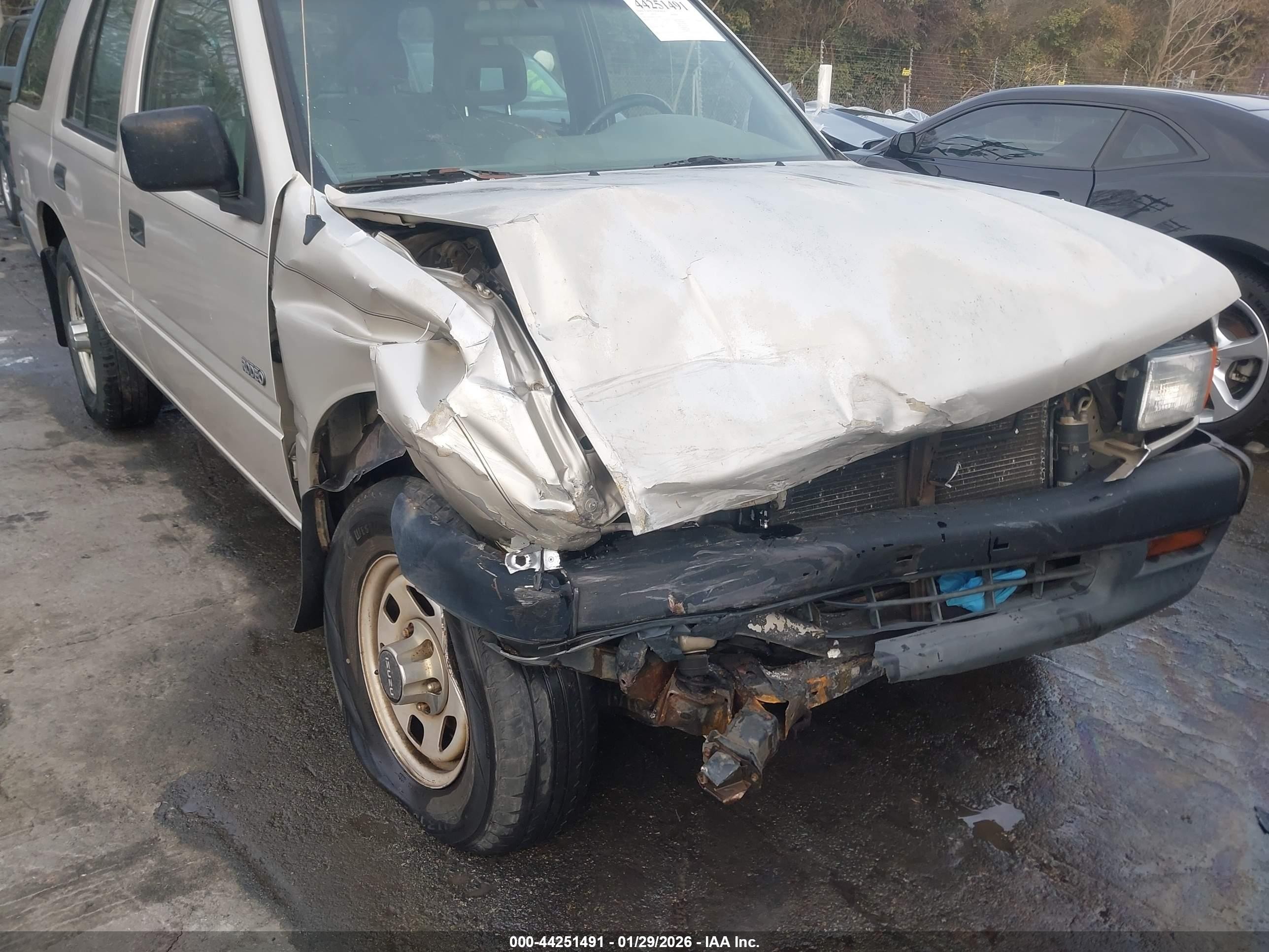 1997 Isuzu Rodeo S 2.6l Tan vin: 4S2CK58E5V4322383