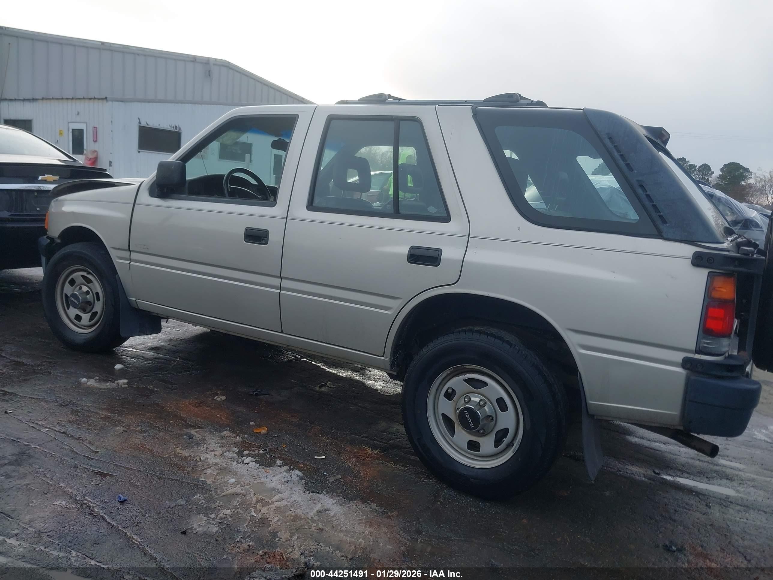 1997 Isuzu Rodeo S 2.6l Tan vin: 4S2CK58E5V4322383