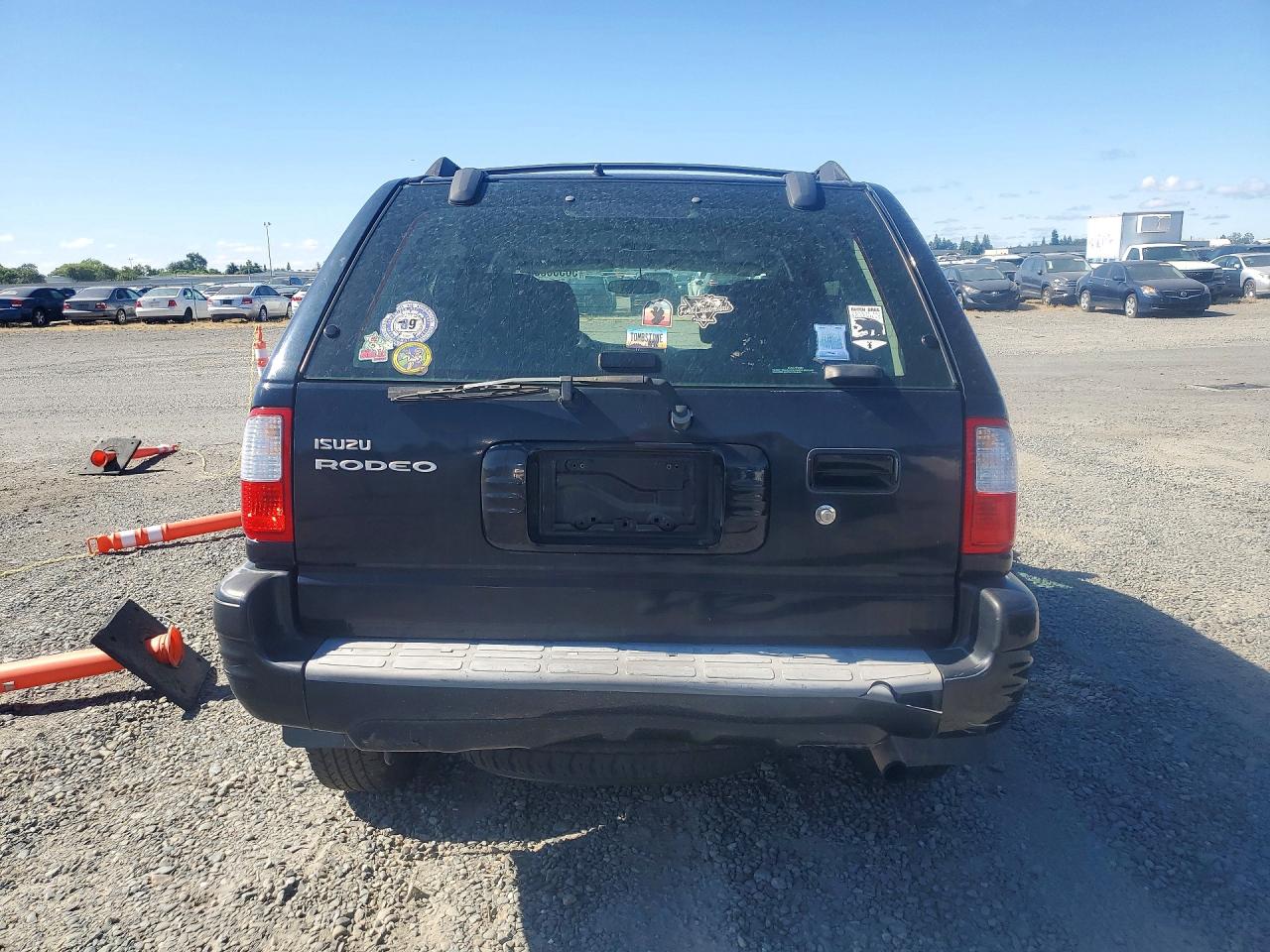 2002 Isuzu Rodeo S Black vin: 4S2CK58W324335881