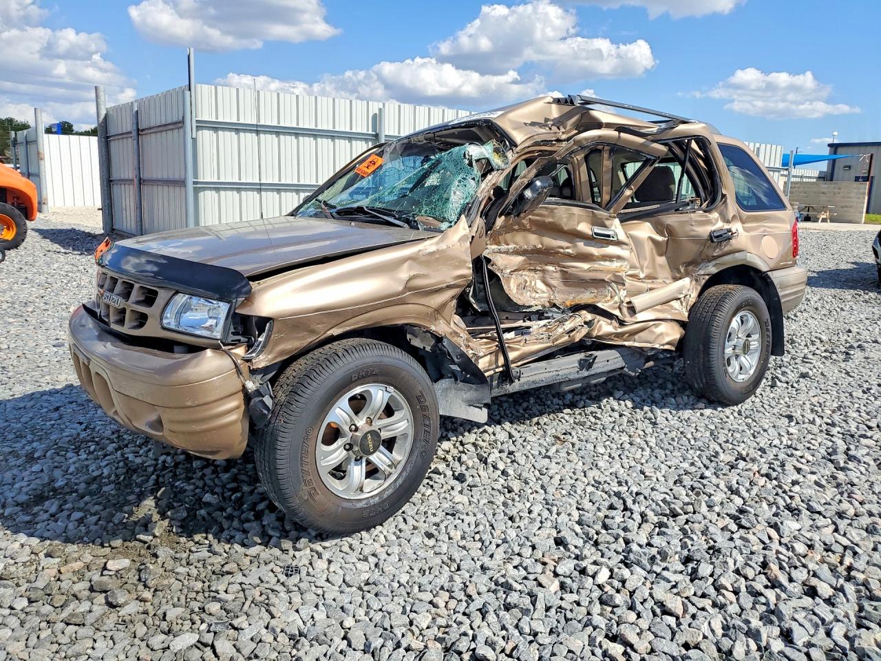 2001 Isuzu Rodeo S Tan vin: 4S2CK58W714306169