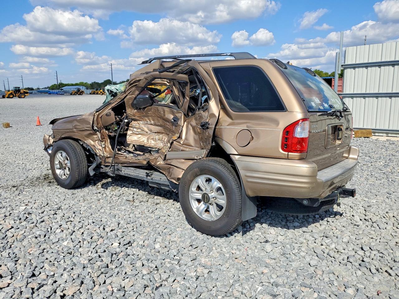 2001 Isuzu Rodeo S Tan vin: 4S2CK58W714306169
